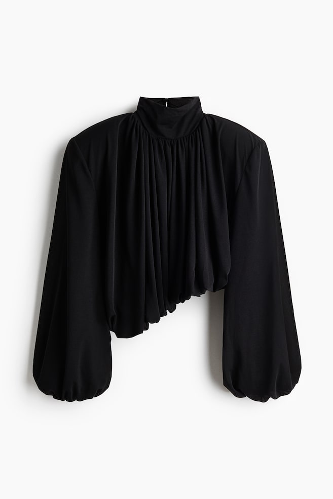 Shirt mit Schulterpolstern und Ballonsaum - Schwarz - 1