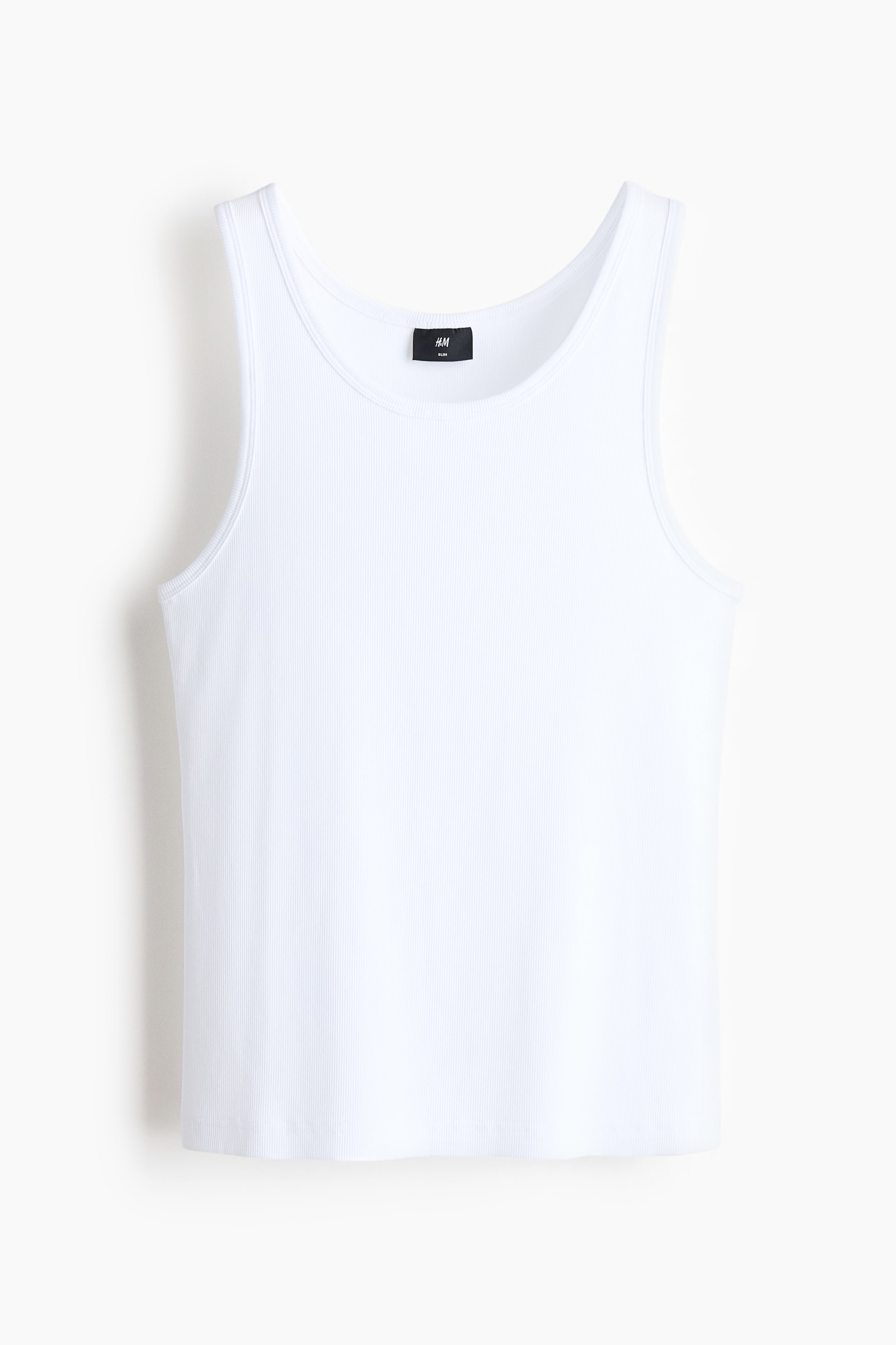 Xem ảnh lớn hơn: Áo vest dáng ôm màu trắng bằng vải cotton jersey gân đang được hiển thị phía trước. Nó có đặc điểm là cổ tròn cổ điển và dây đeo vai rộng.