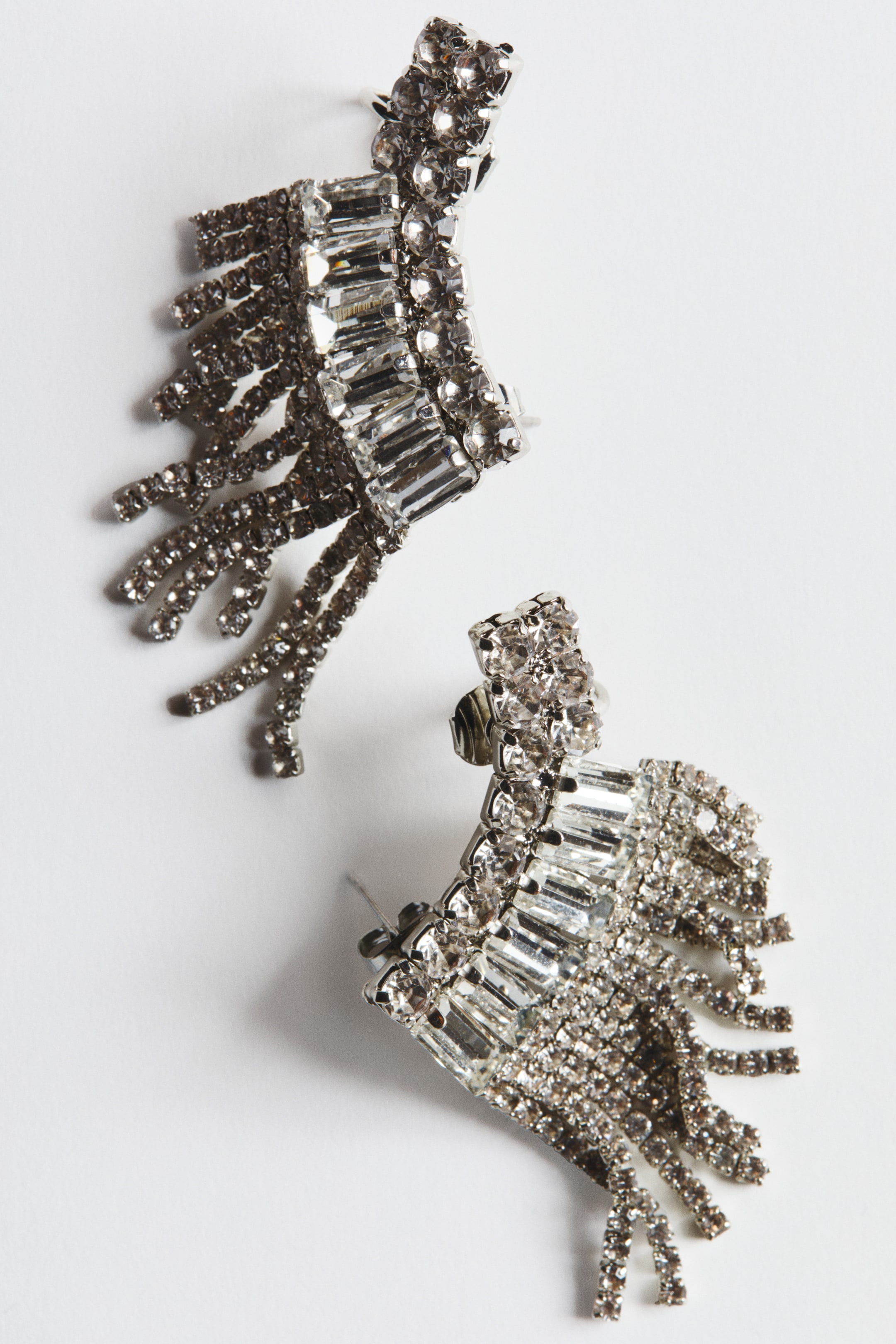 拡大画像を表示: Wing-shaped rhinestone earrings - シルバーカラー | H&M JP 1