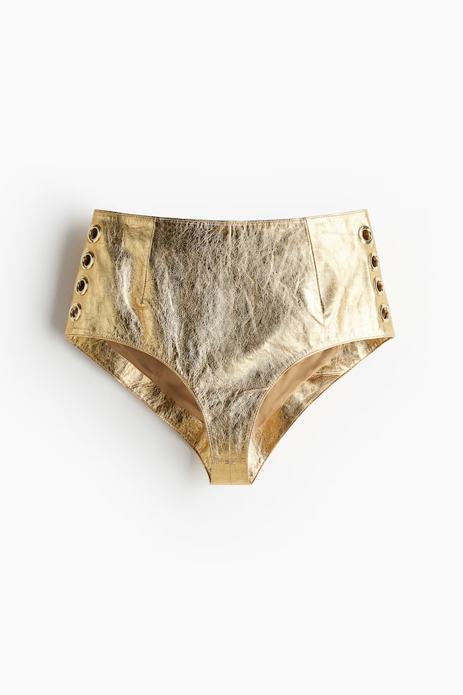 Minishorts de piel con ojales decorativos - Dorado - 1