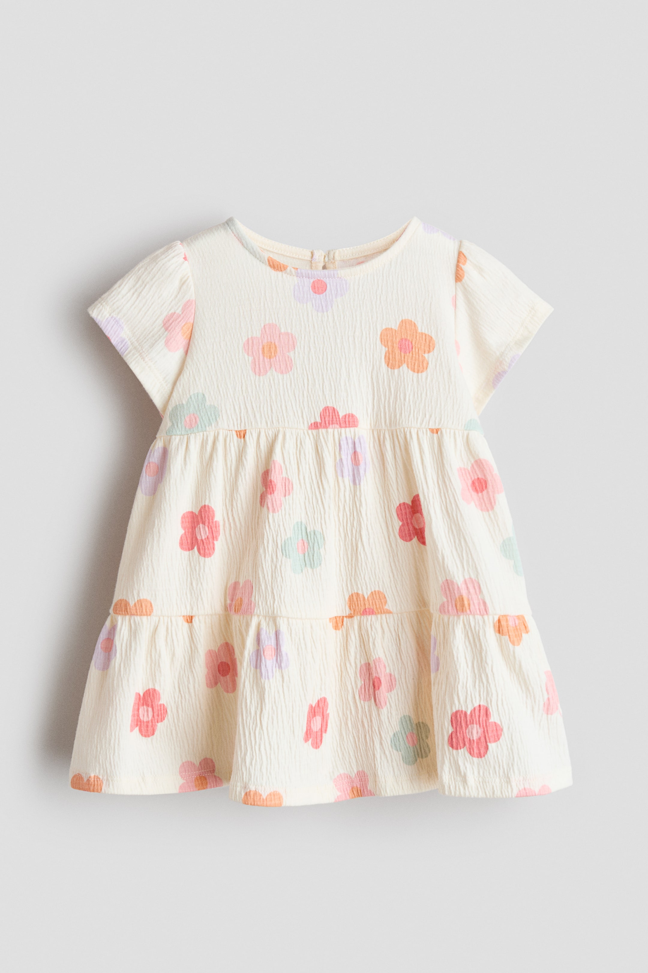 Ampliar la imagen: Vestido de punto con diseño - Beige claro/Floreado - Kids | H&M MX 1