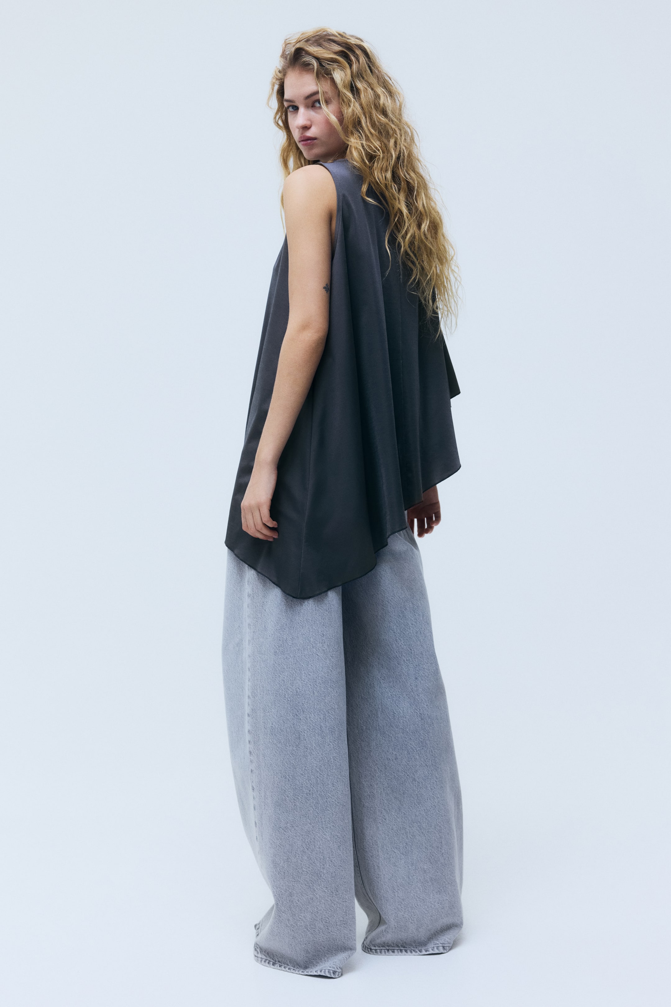 Asymmetric Cape Top