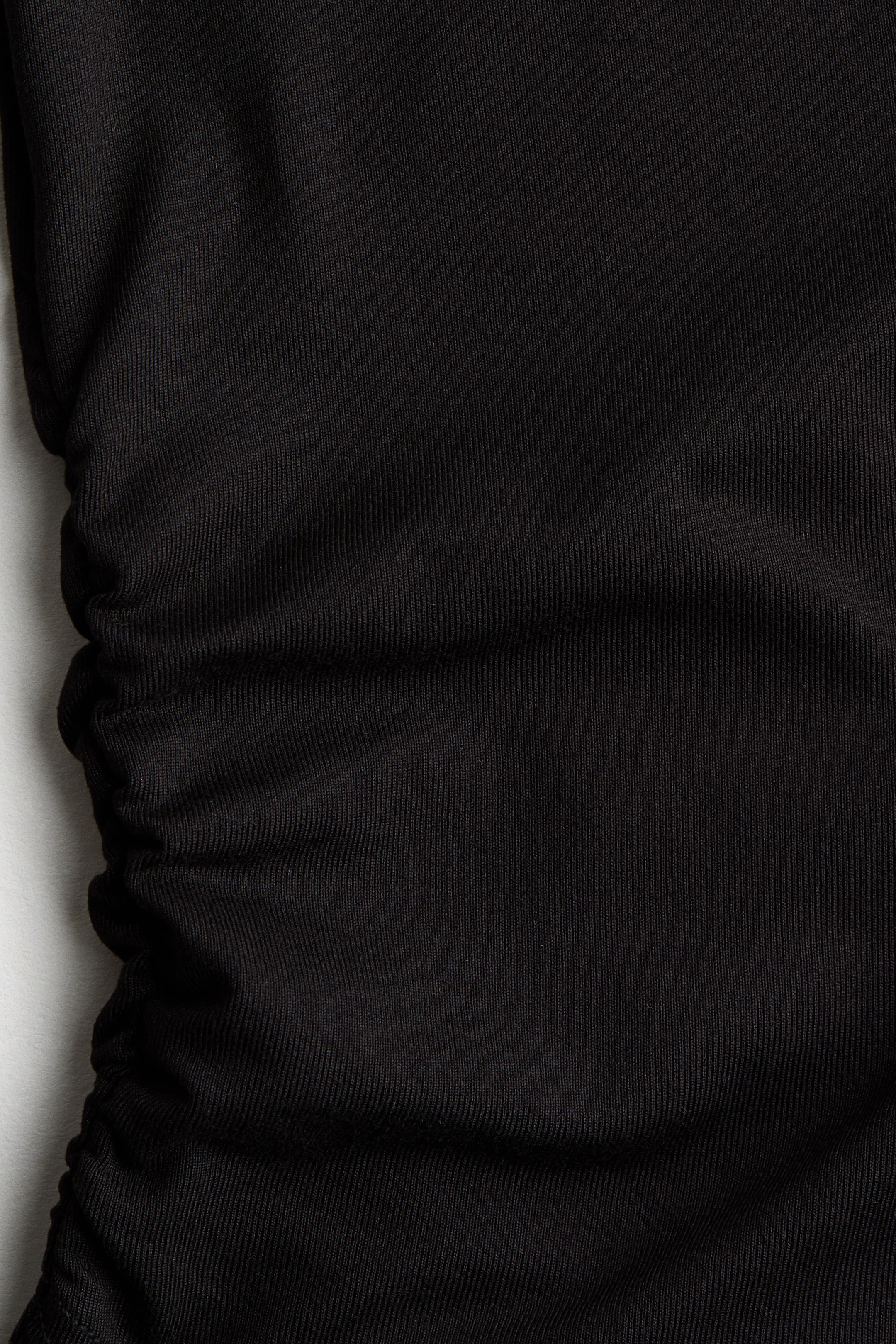 Ampliar la imagen: Sports top with SoftMove™ - Negro - Kids | H&M MX 2