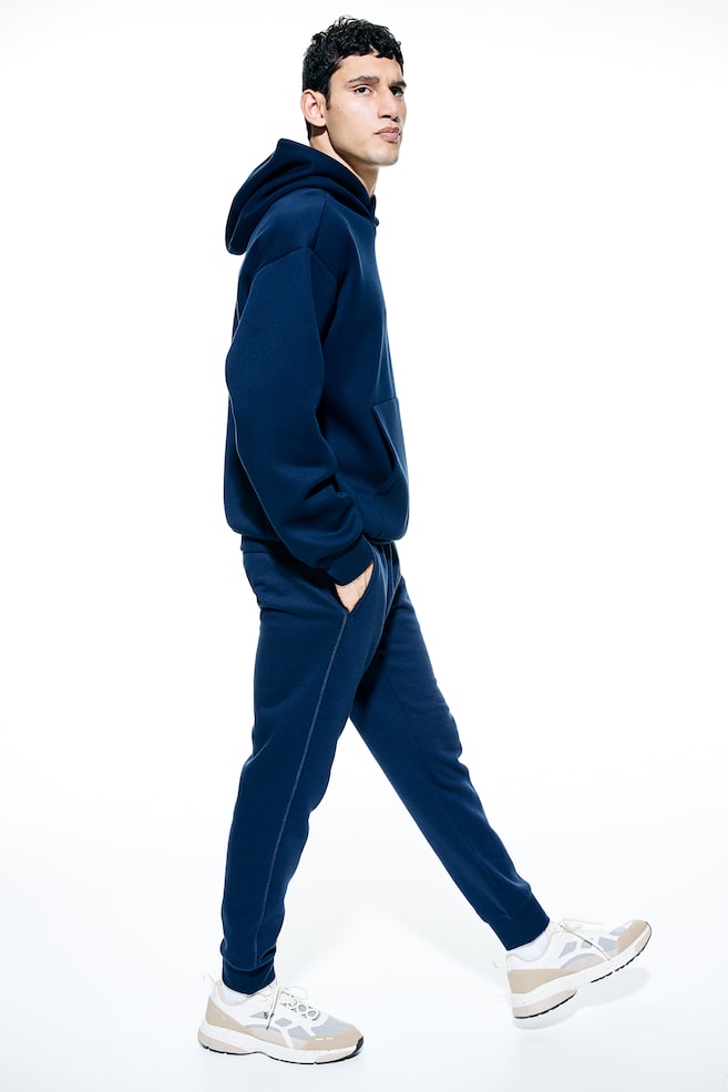 Pantalon jogger de sport avec jambes effilées - Bleu foncé/Noir/Gris clair chiné - 1