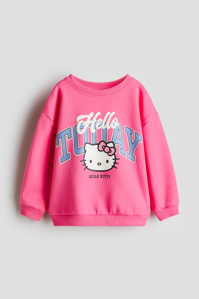 Printed Sweatshirt - Pink/Hello Kitty/White/Hello Kitty/Light blue/Hello Kitty/Gray melange/Lilo & Stitch/Cream/Hello Kitty/Purple/Lilo & Stitch/Pink/Minnie Mouse/Pink/Lilo & Stitch/White/Peppa Pig/Light beige/Lilo & Stitch/White/Minnie Mouse/Pink/Peppa Pig/Light blue/Cinnamoroll/Light purple/pink/Light blue/Frozen/Light pink/Squishmallows/Cream/Bluey/Light purple/Hello Kitty/White/Kuromi/Turquoise/Gabby's Dollhouse - 1