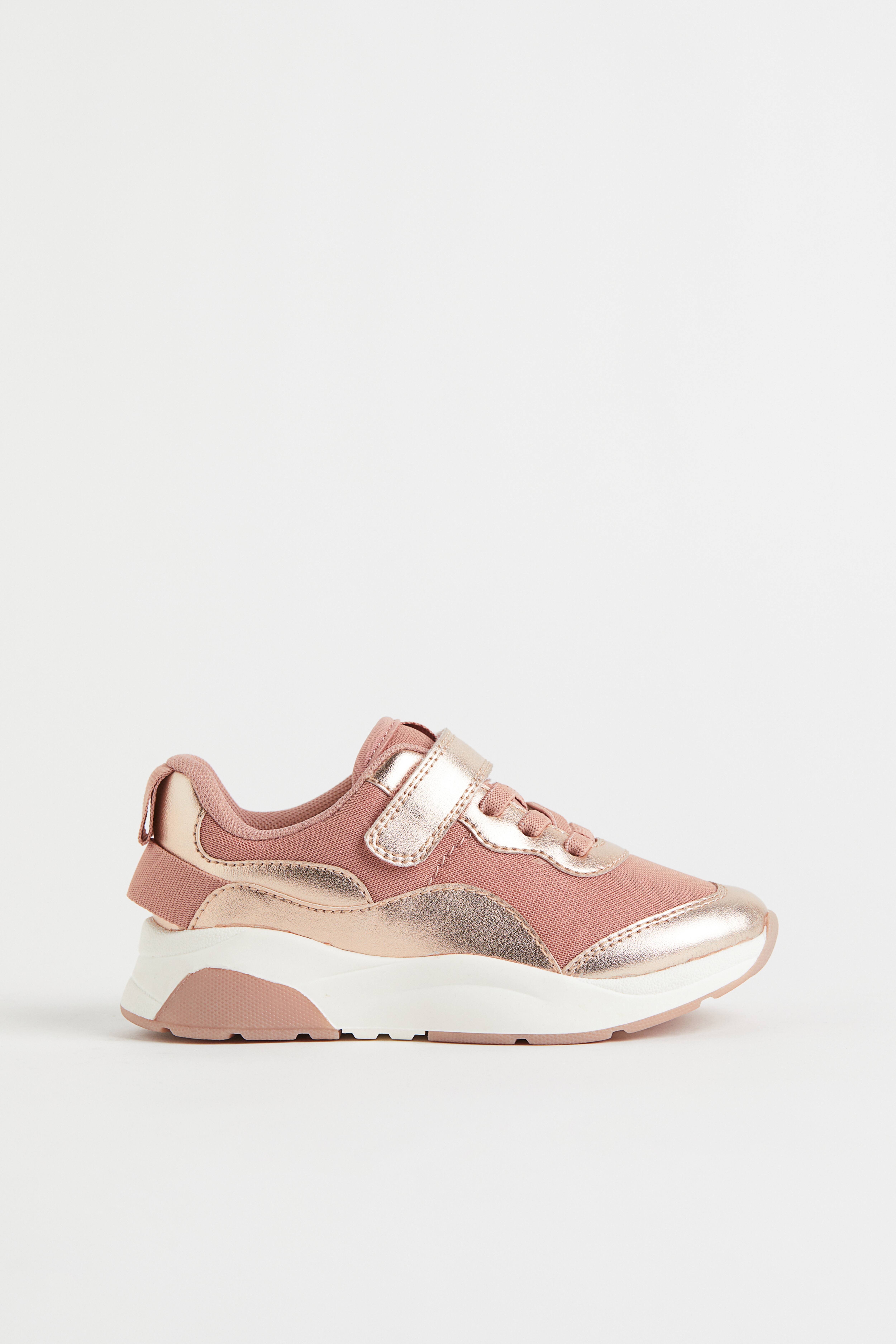 Rose coloured shops trainers