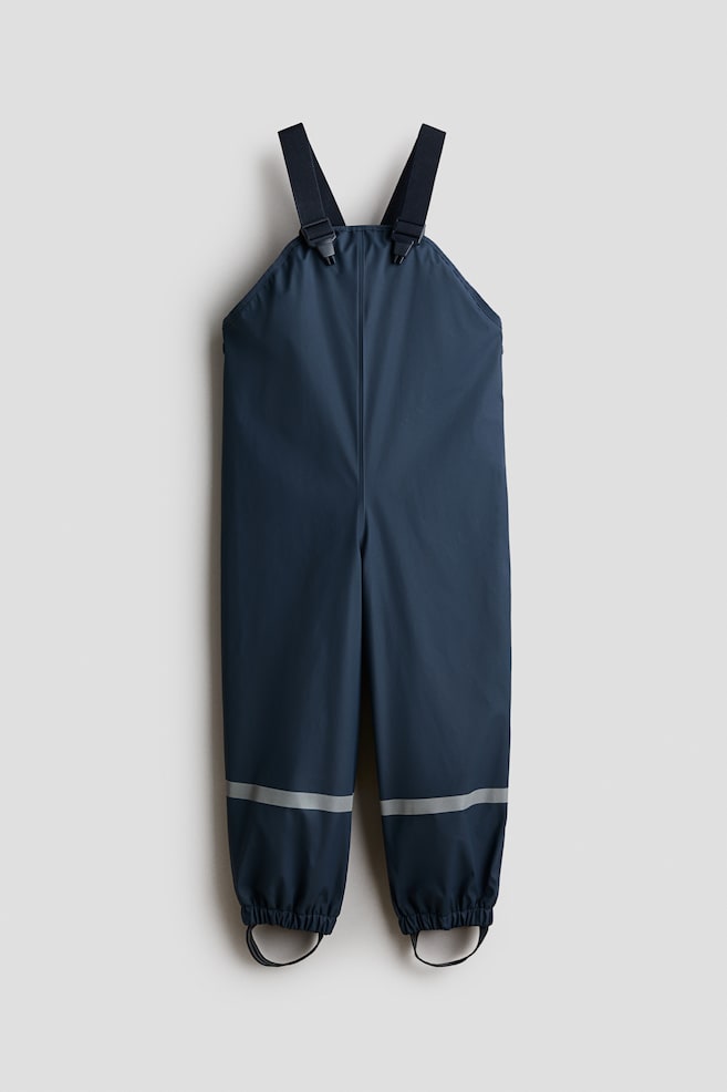 Fleece-lined rain trousers - Dark blue - 1