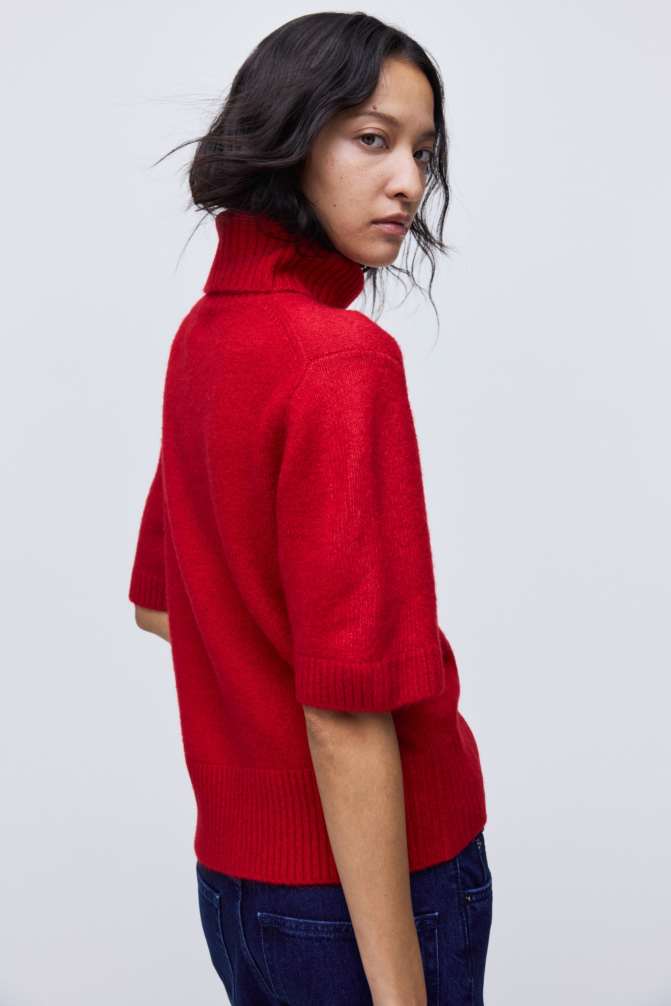 Knitted polo-neck top