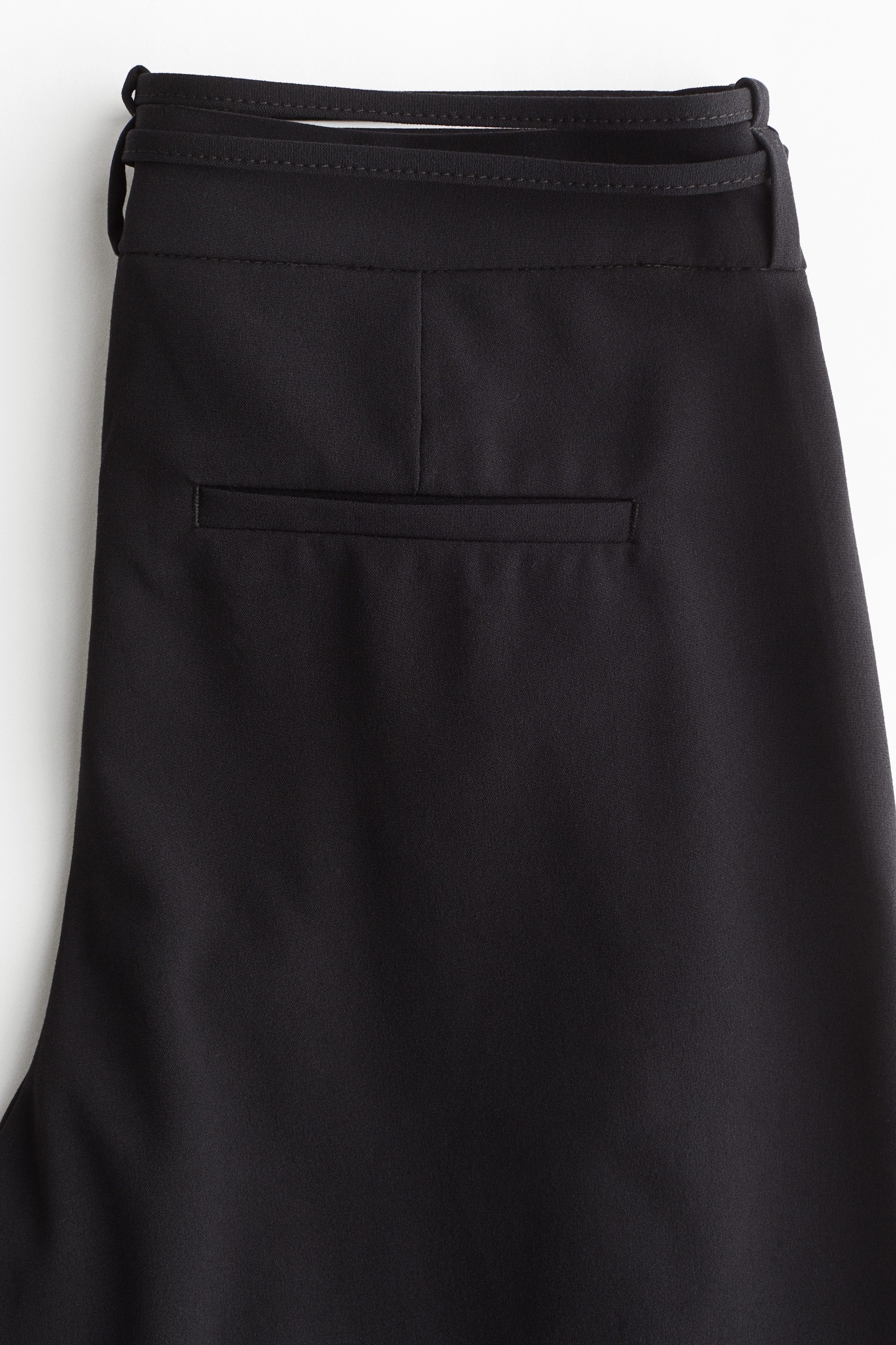 Belted tailored trousers