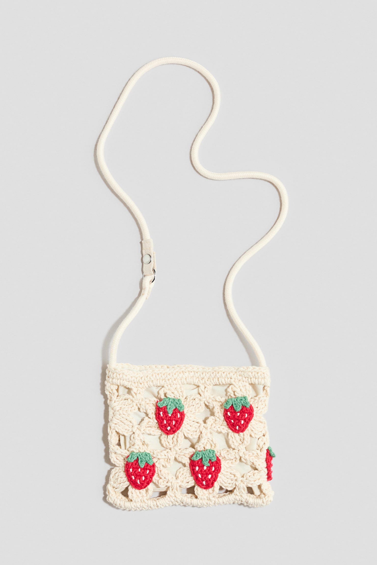 Crossbody-väska i bomull med virkad look - Crèmevit/Jordgubbar