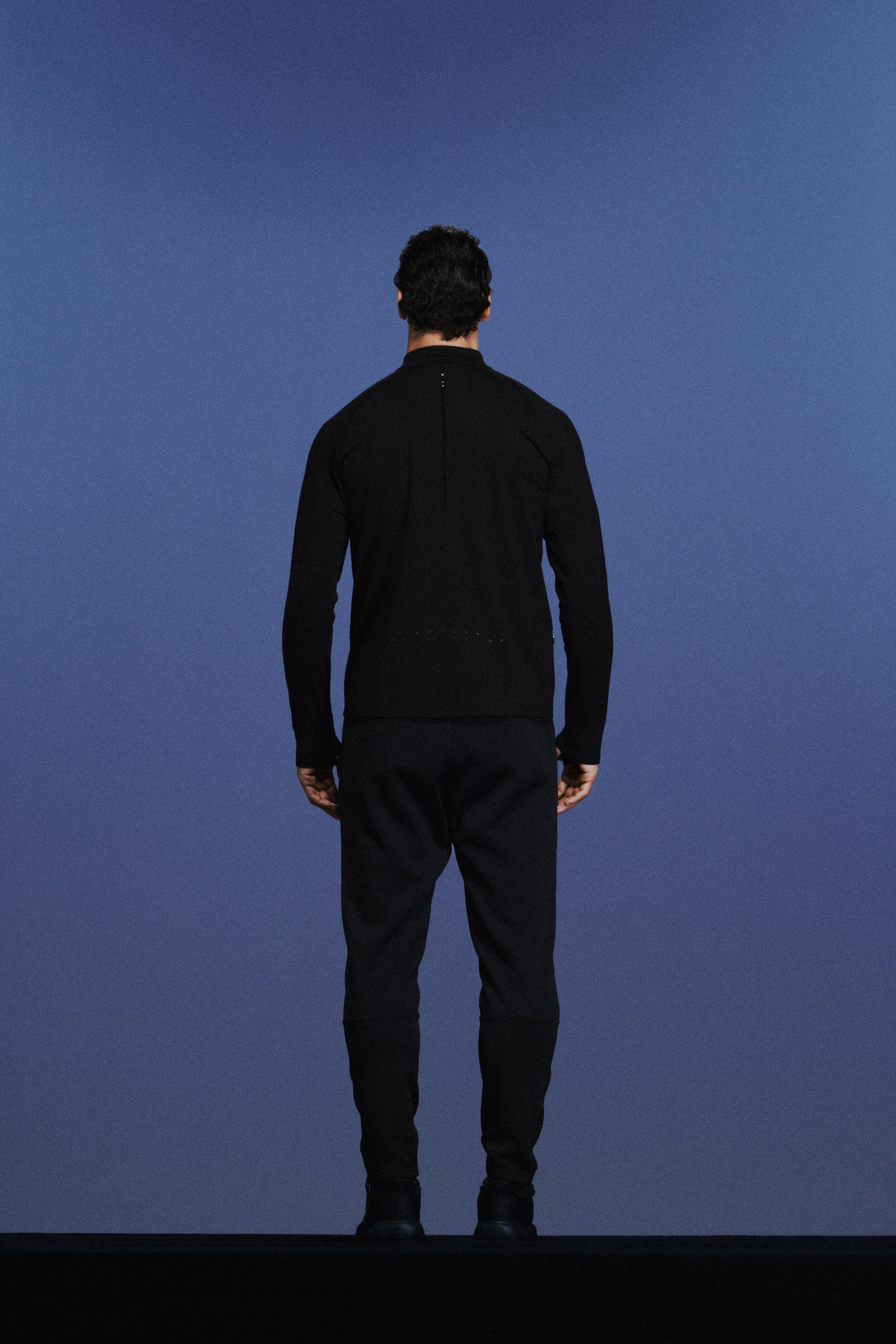 View larger image: Warming zip-top sports top with ThermoMove™ - Black/Move Zlatan - Men | H&M IE 4