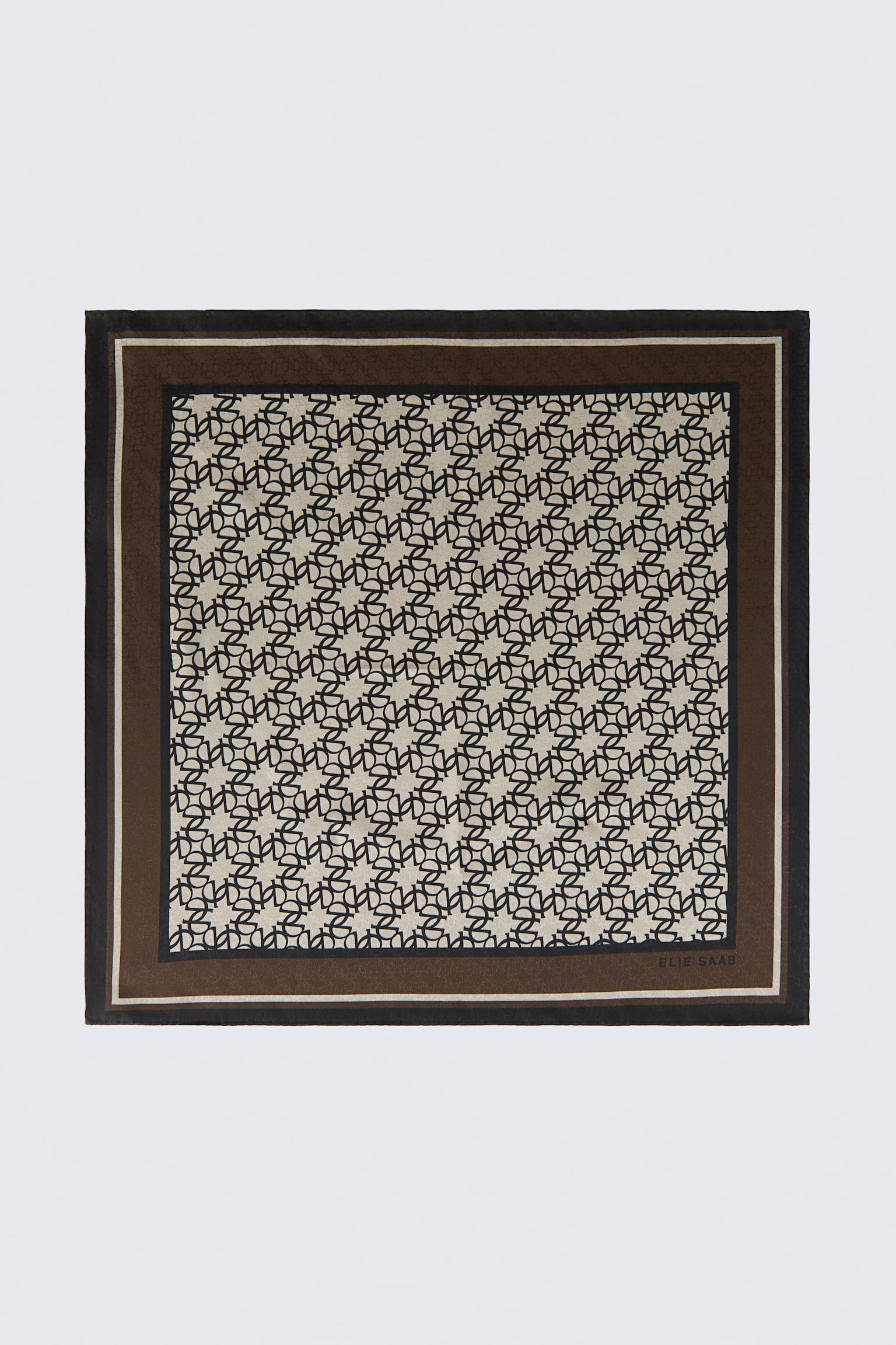 This square jacquard weave silk scarf is laid flat, showcasing an interlocking black monogram pattern on a beige background. The central patterned area is framed by a thick brown border with a thin cream stripe and a black outer edge, with the brand name "ELIE SAAB" printed in the bottom right corner.