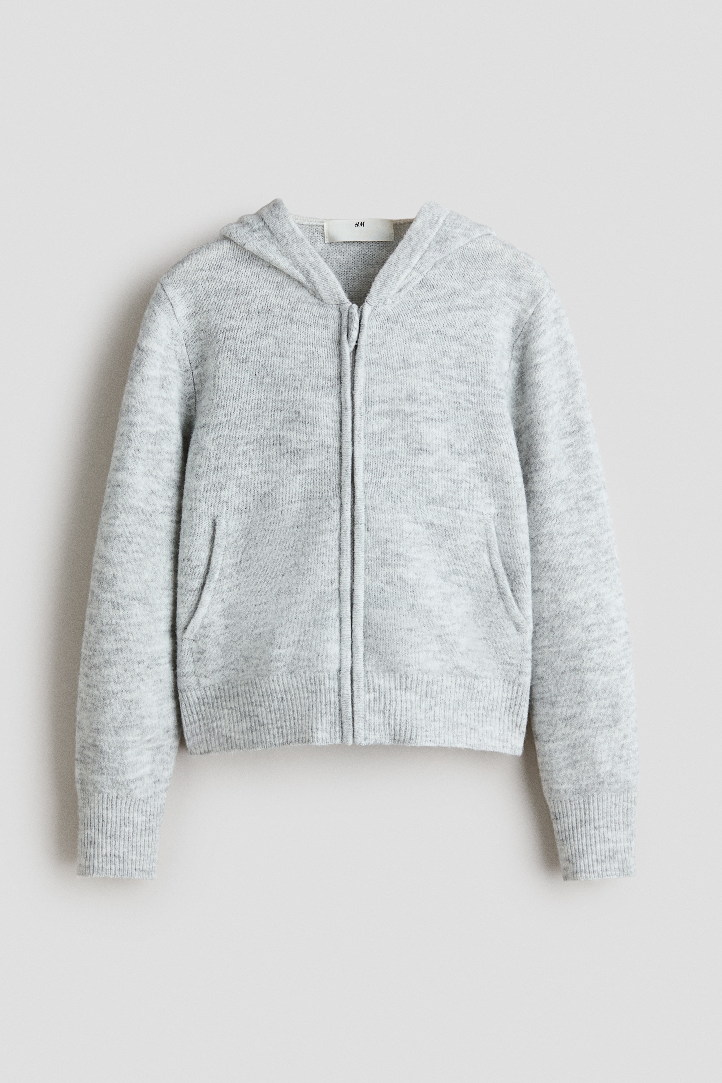 Knitted zip-through hoodieModel