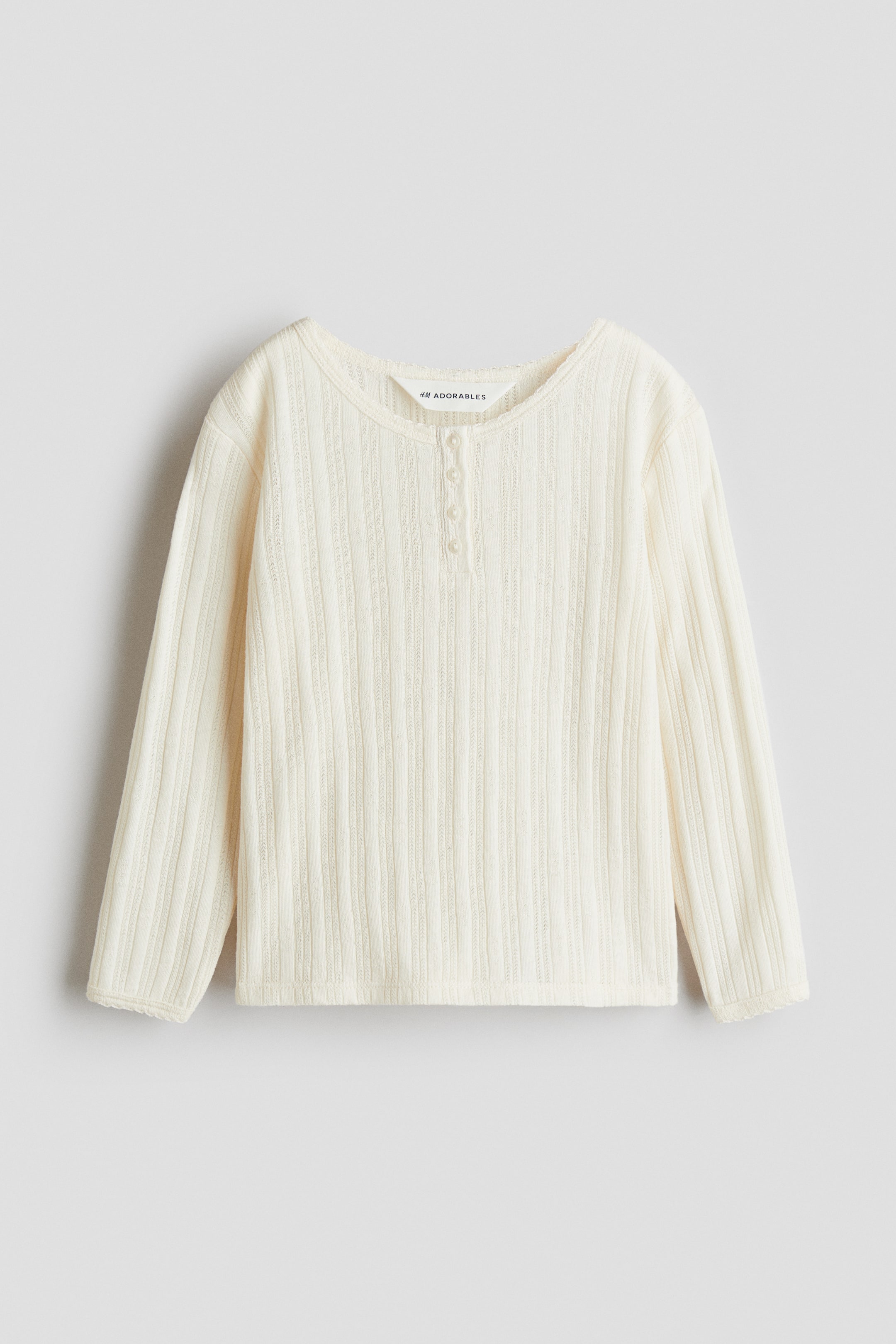 Ampliar la imagen: Top en tejido pointelle - Crema - Kids | H&M MX 1