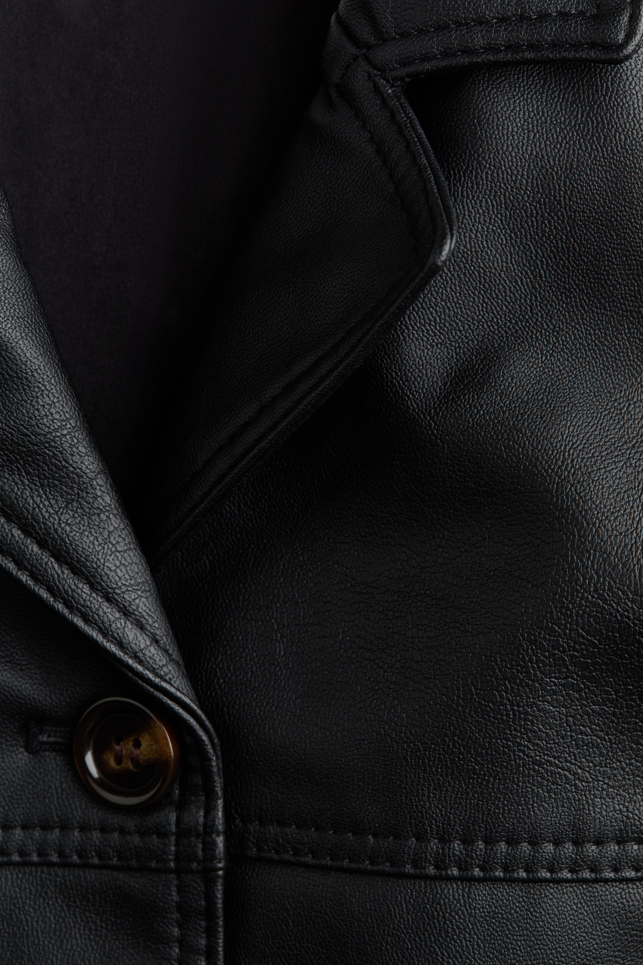 Veste en tissu enduit