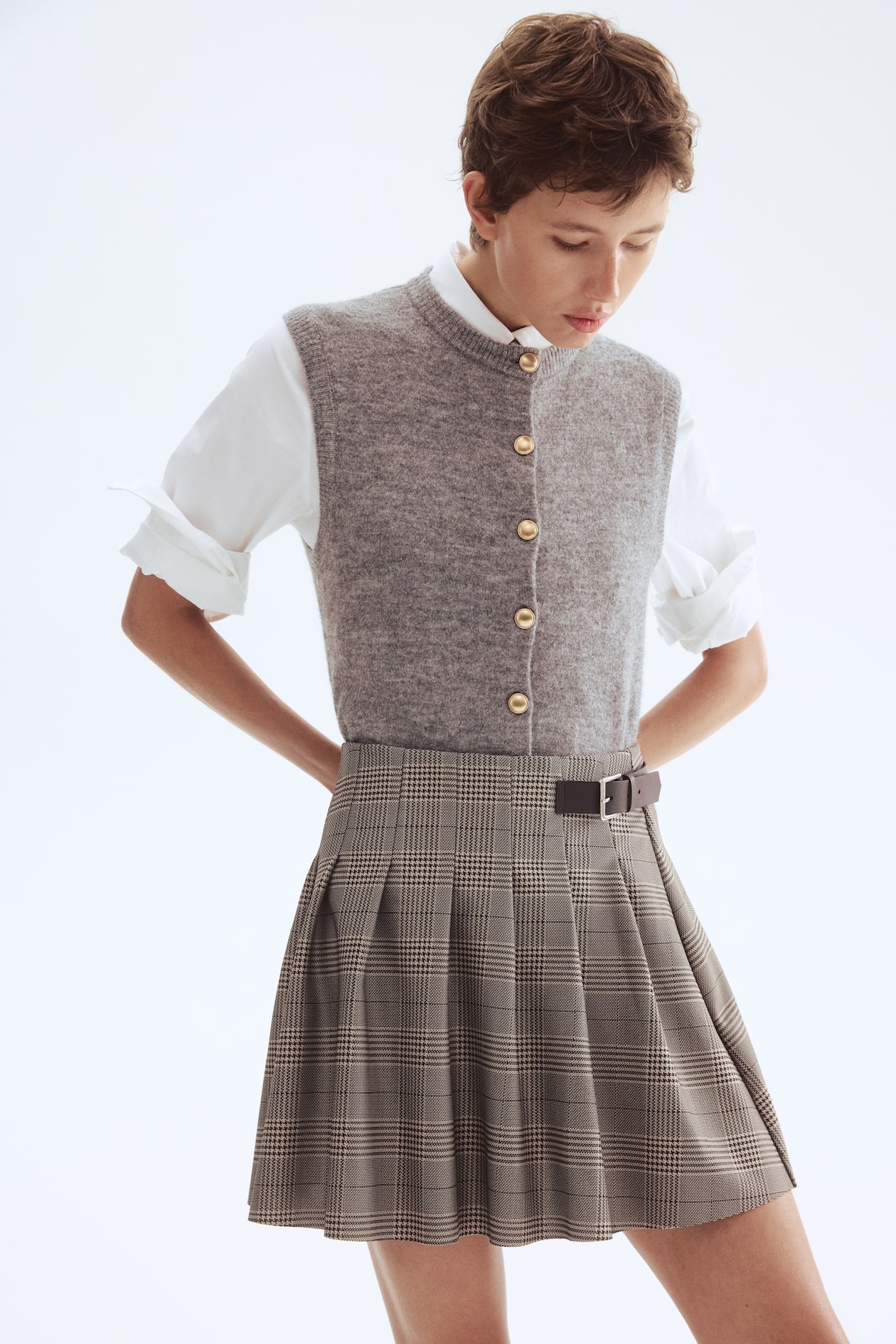 Pleated mini skirt - Dark brown/Checked - Ladies | H&M GB