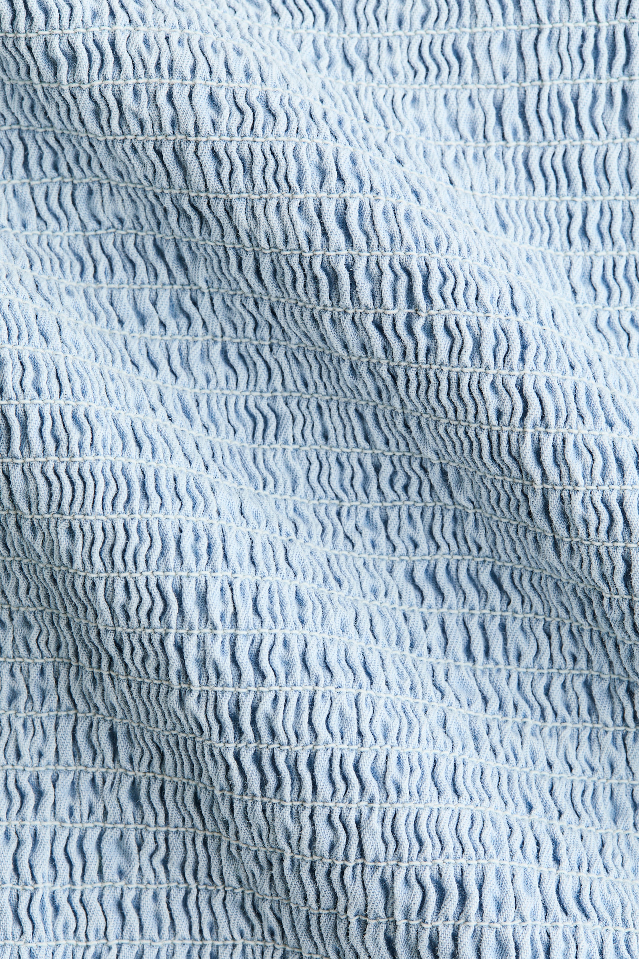 Blouse à nid d'abeille en denim