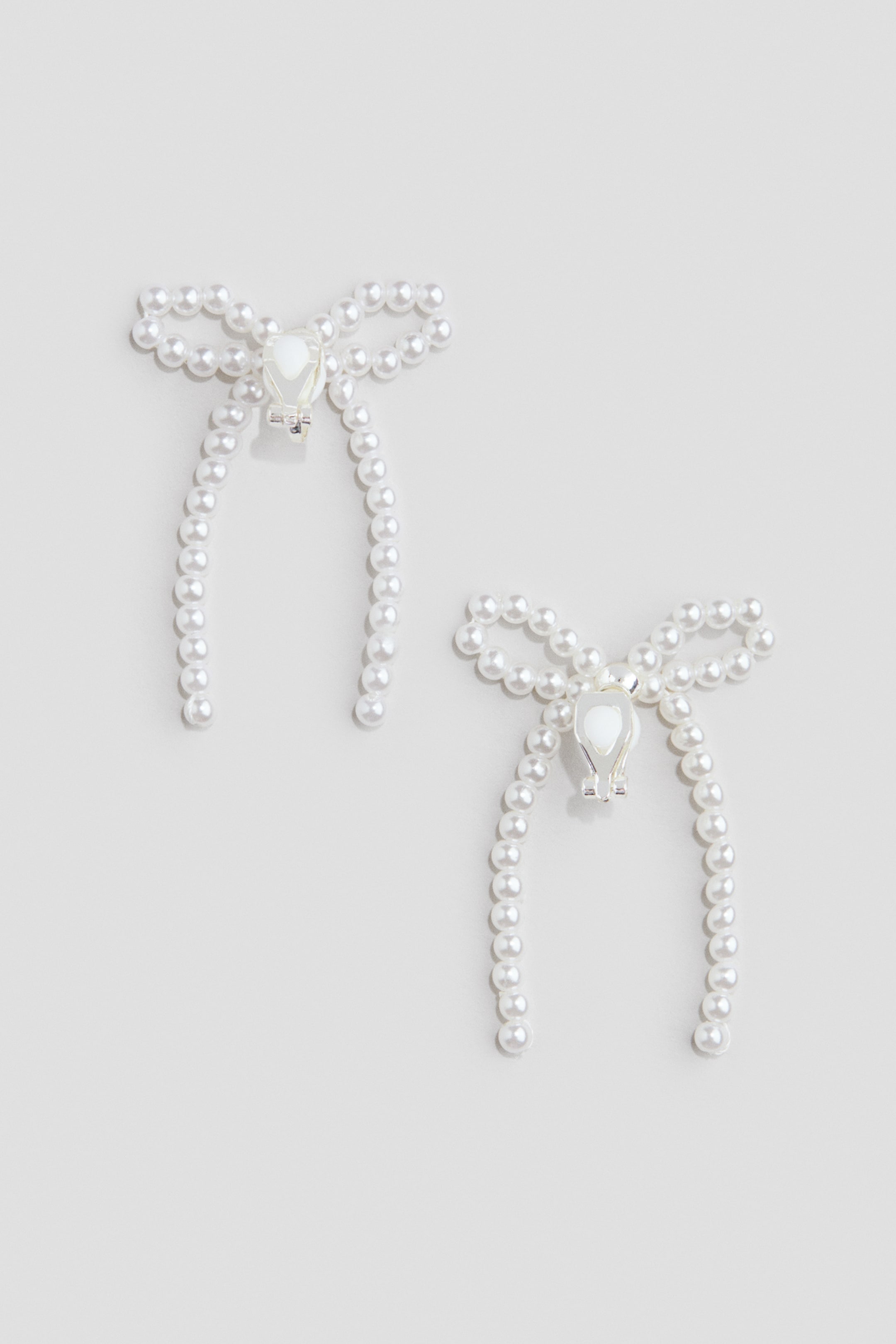 Se større billede: Sløjfeformede clipsøreringe - Hvid - BØRN | H&M DK 2