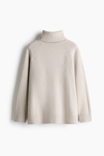 Oversized polo-neck jumper