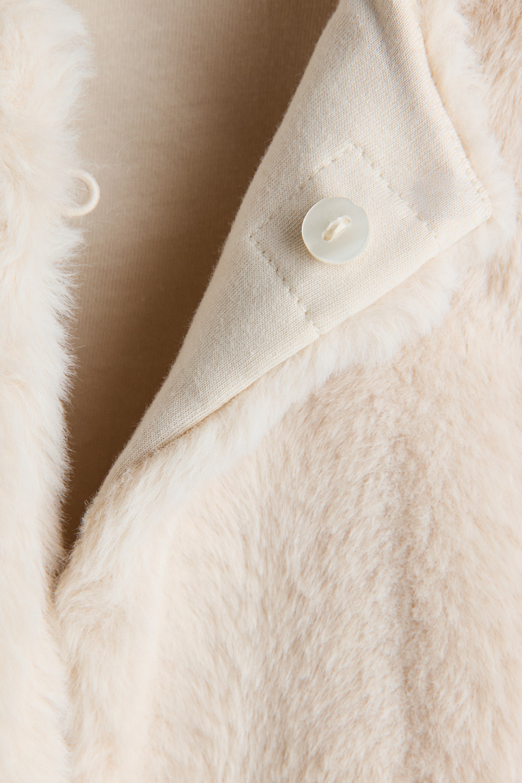 Veste sans manches duveteuse