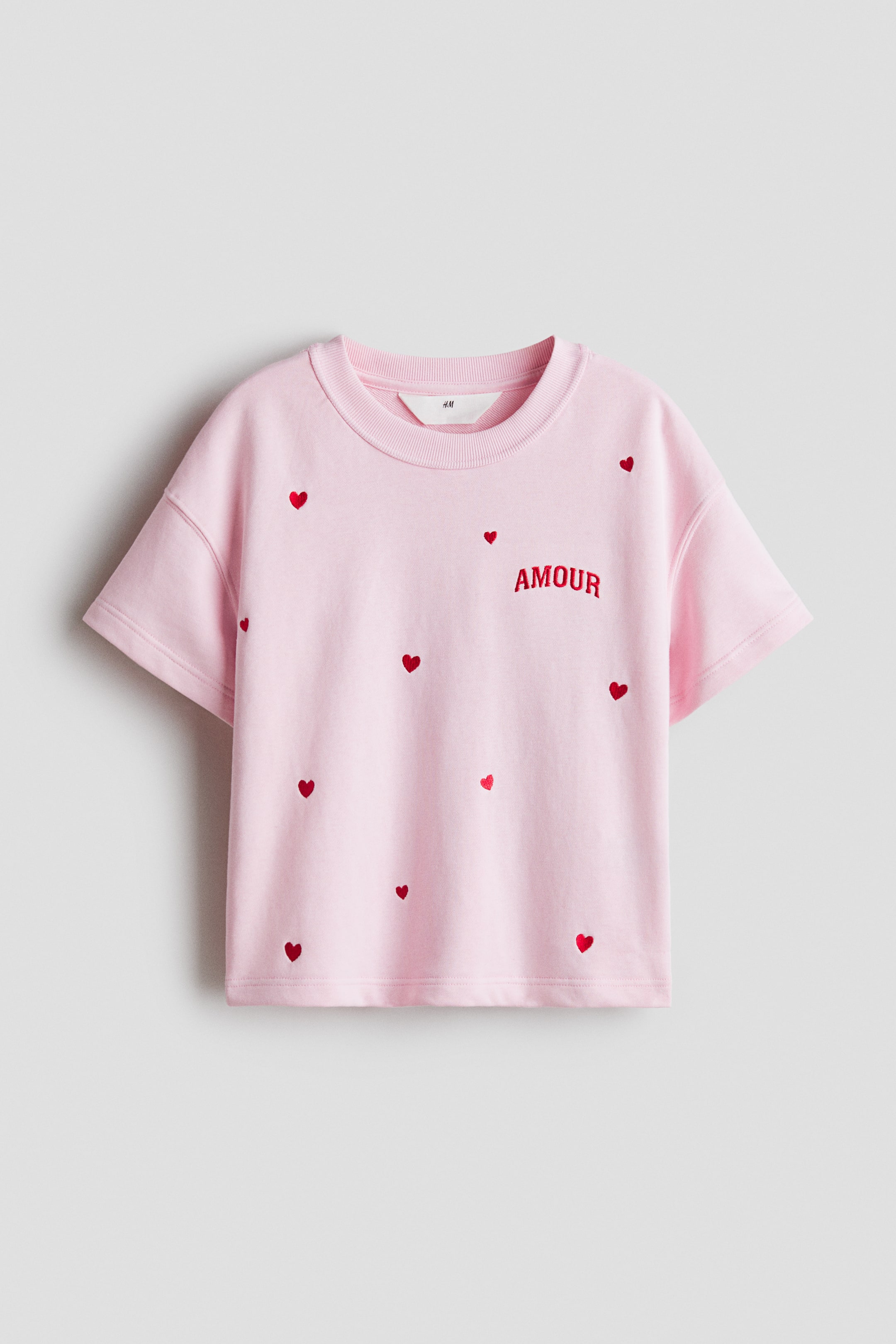 Büyük resmi görüntüle: Bol Kesimli ve Motif Detaylı Tişört - Pembe/Amour - ÇOCUK | H&M TR 1