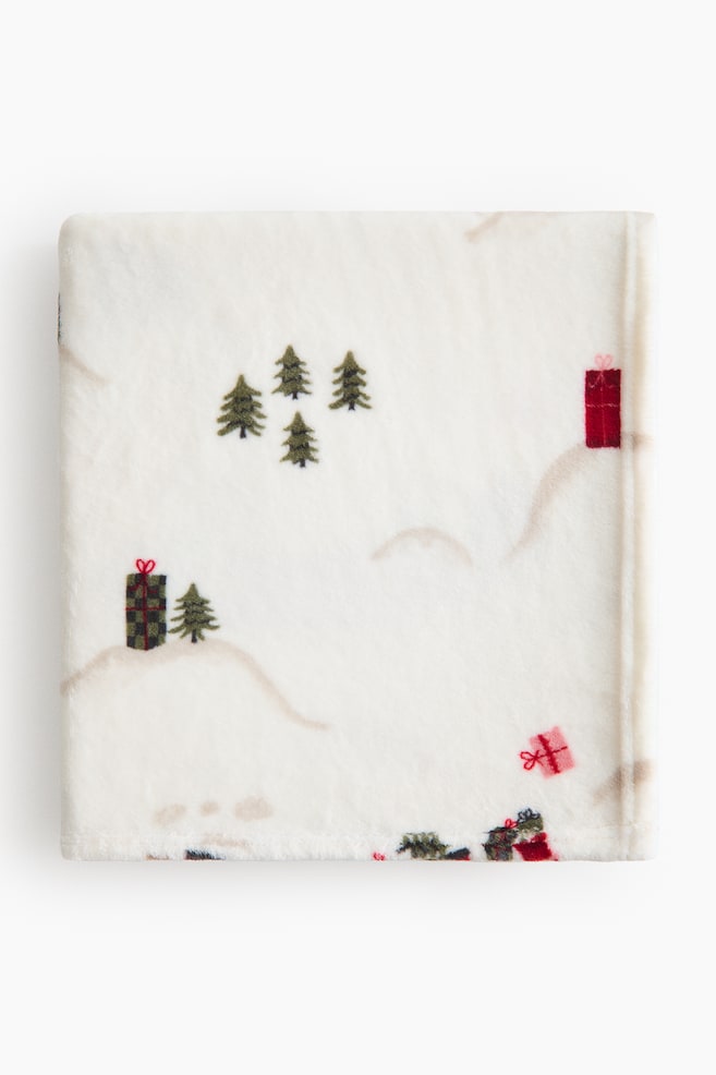 Patterned fleece blanket - Cream/Patterned/Light green/Vehicles/Light beige/Dinosaurs/Cream/Spiders/Beige/Croissants/Black/Ghosts/Dark green/Le Petit Campus/Dark red/Le Petit Campus/Red/Christmas/Light beige/Unicorns/Light pink/Cherries/White/Rainbow - 1