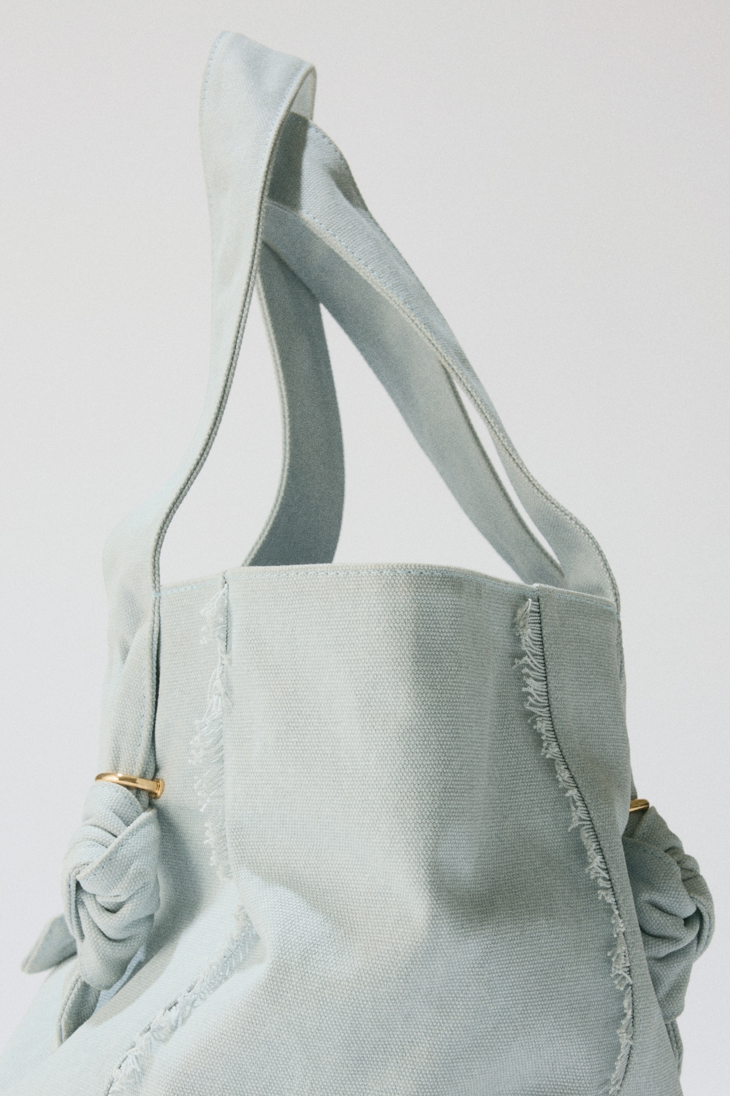 Bolso tote con nudos decorativosAuxiliar