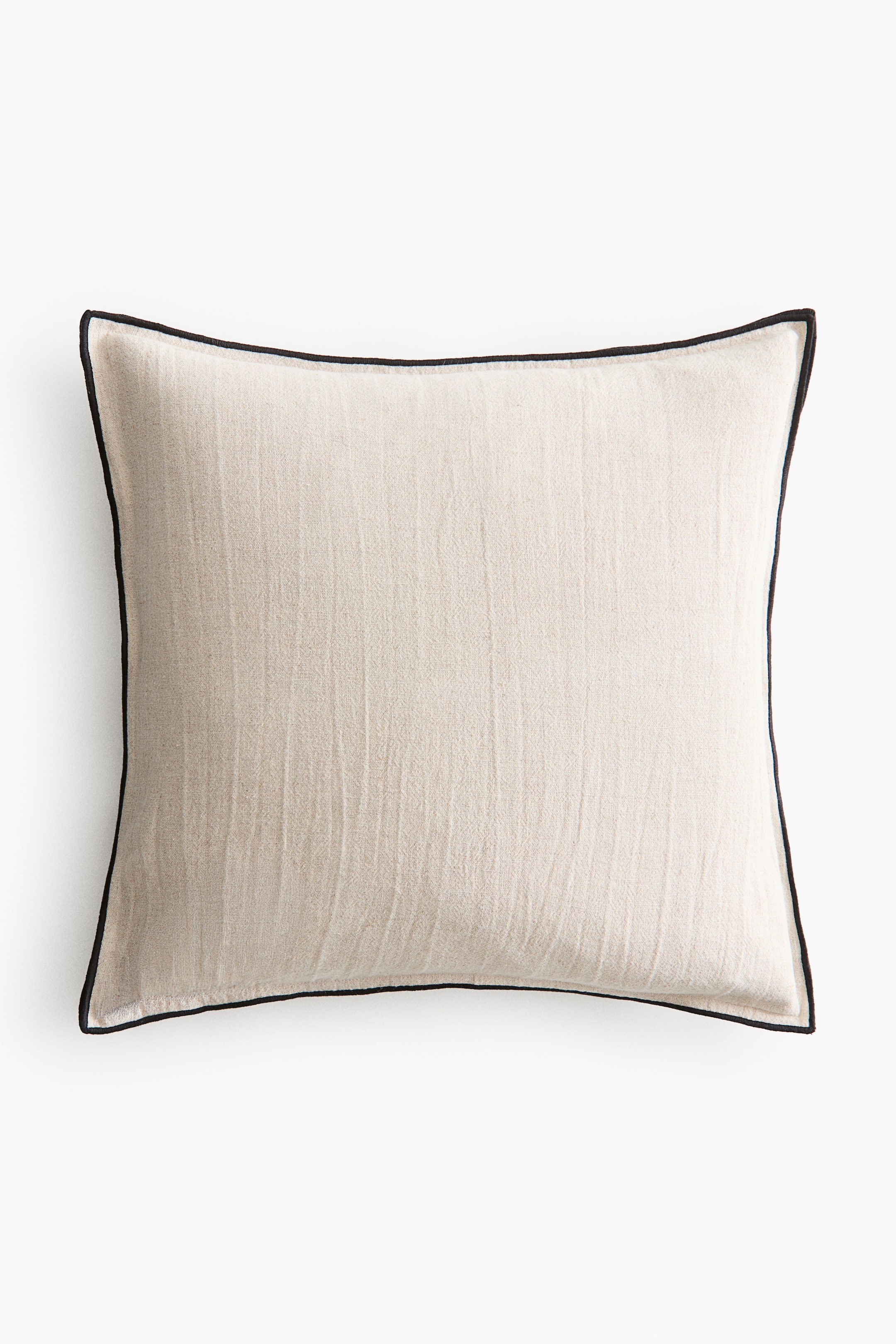 View larger image: A square cushion cover is shown front-facing, made from a light-coloured, textured canvas linen and cotton blend, featuring a double-layered black accent border with overlocked edges along all sides.