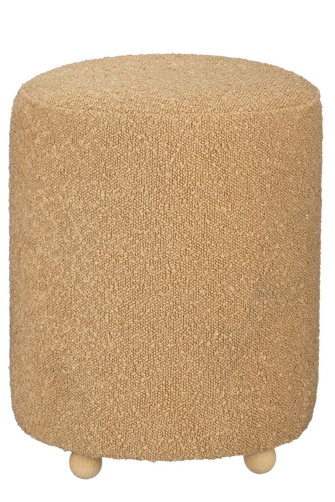 Un pouf cylindrique est revêtu d’un tissu bouclé beige texturé et repose sur de petits pieds en forme de billes de bois arrondies. Le design met en valeur une structure simple et compacte avec un plateau circulaire plat. - 1