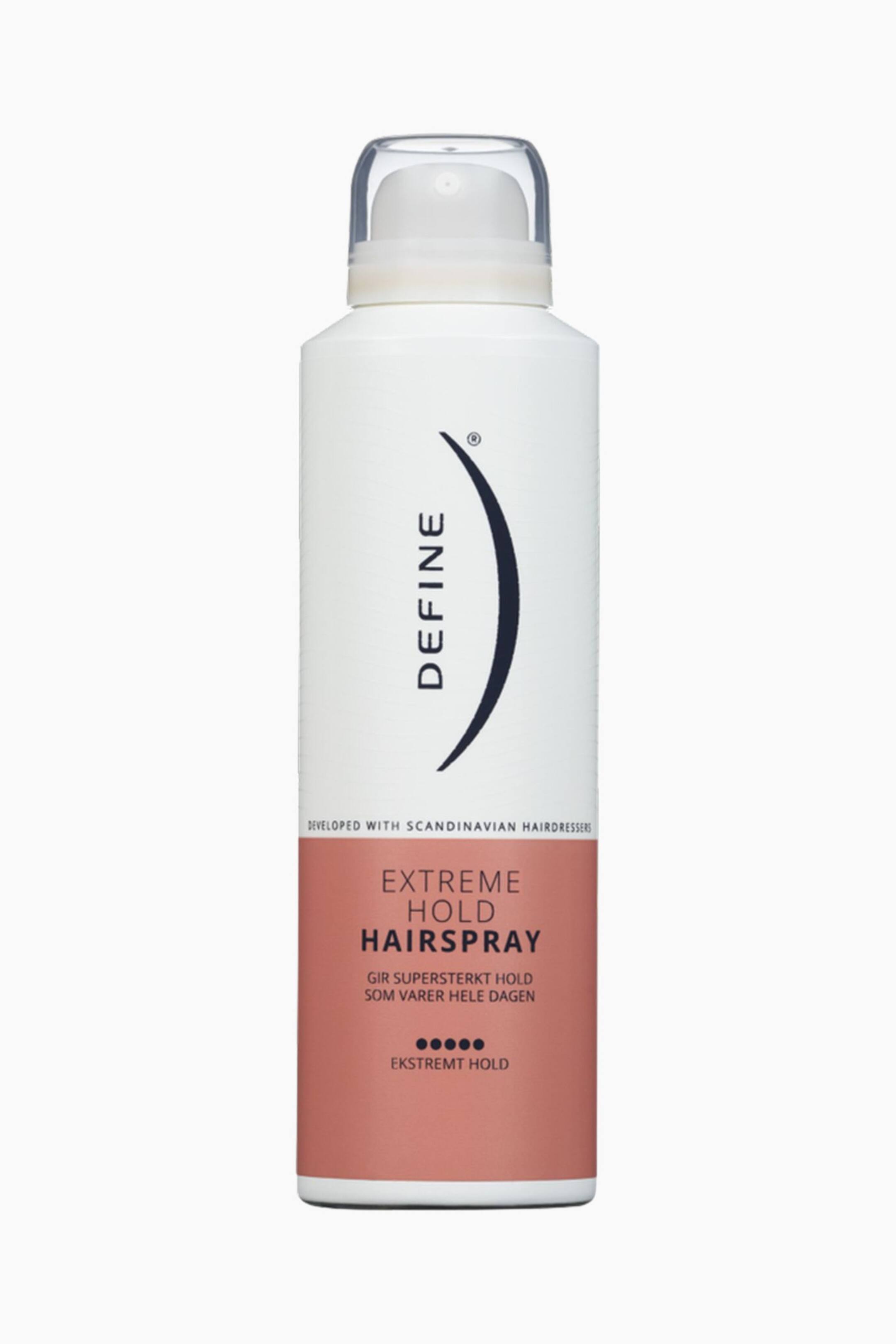 Visa större bild: En vit cylindrisk flaska med Define Extreme Hold Hairspray står upprätt och har en transparent plastkork. Etiketten visar "DEFINE" vertikalt på den vita övre sektionen och "EXTREME HOLD HAIRSPRAY" på den laxrosa nedre sektionen.