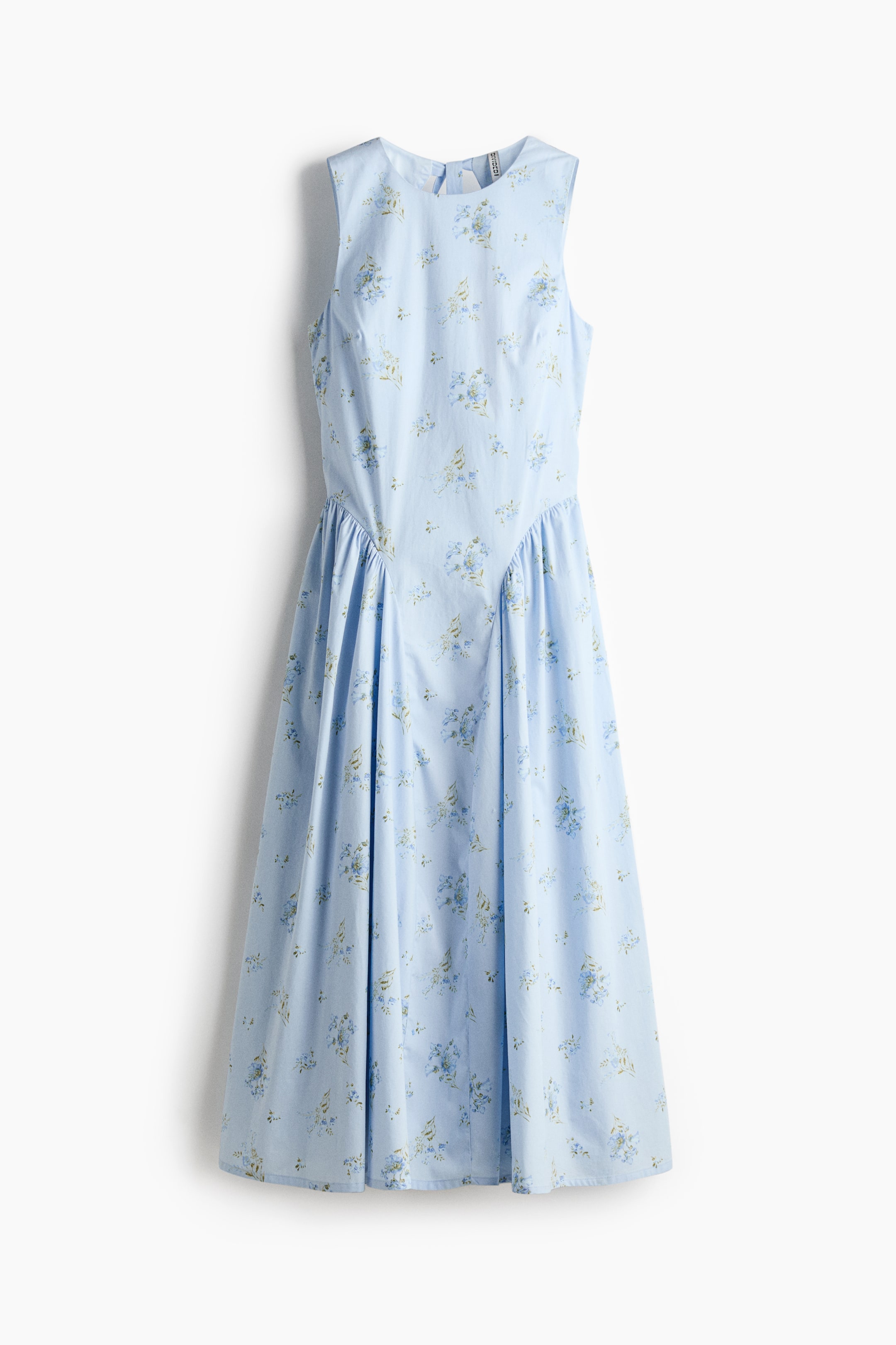 View larger image: A calf-length, sleeveless dress in crisp light blue cotton poplin is showcasing its front, adorned with a delicate floral print. It is crafted with a round neckline, a tailored bodice, and a flared skirt that gathers over the hips for enhanced volume.