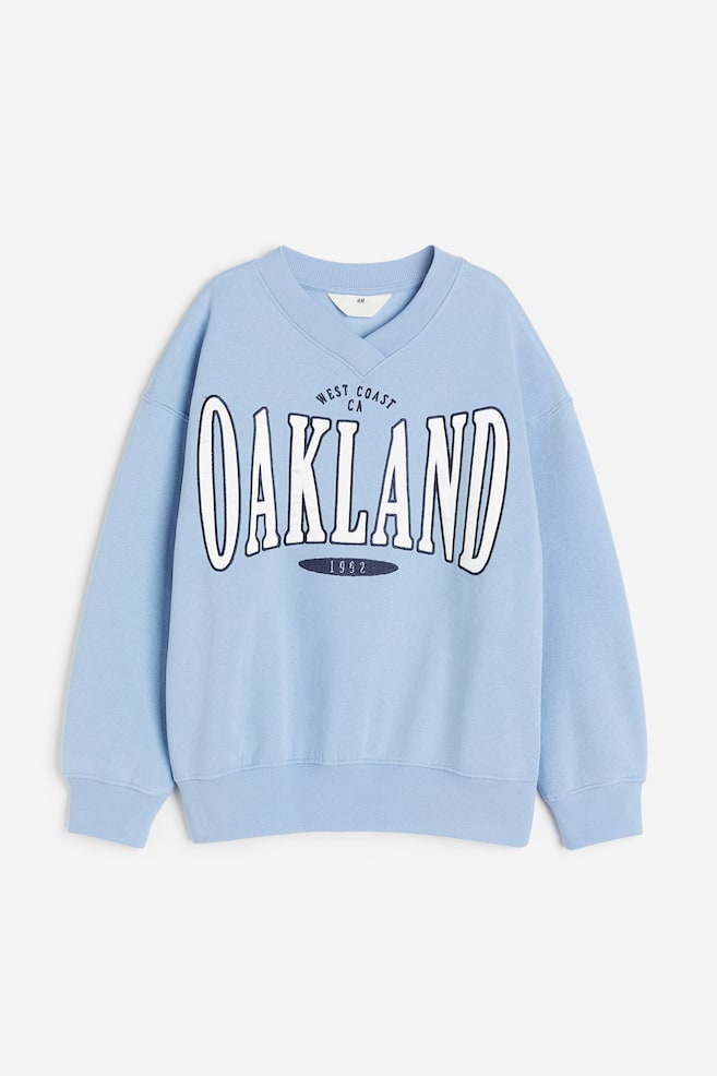 Oversized Sweatshirt - Hellblau/Oakland/Helllila/Schmetterling/Dunkelgrün/New York/Grau/Schmetterling - 1