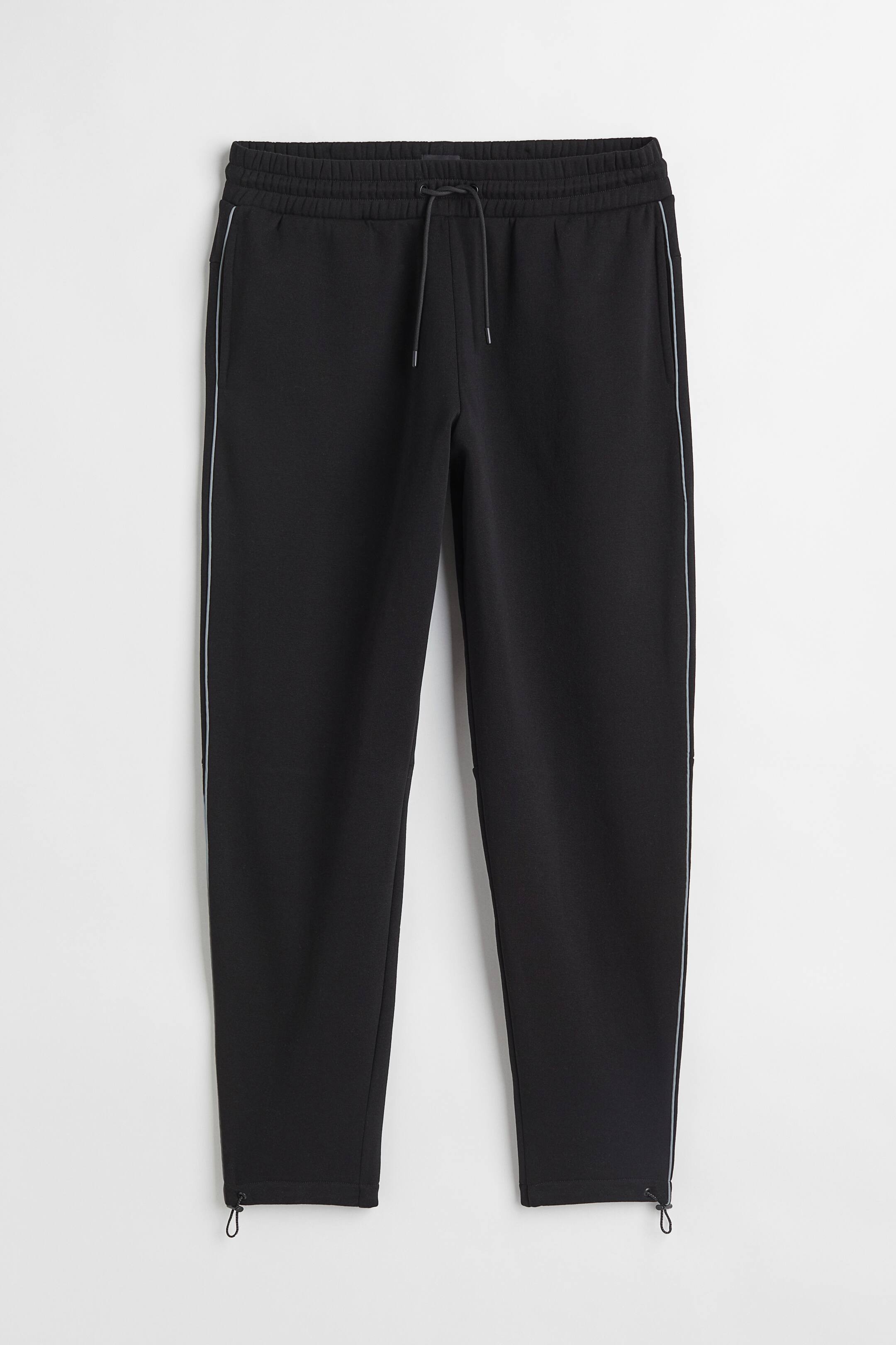 הצגת תמונה גדולה יותר: מכנסי טרנינג Regular Fit - Black - Men | H&M IL 1