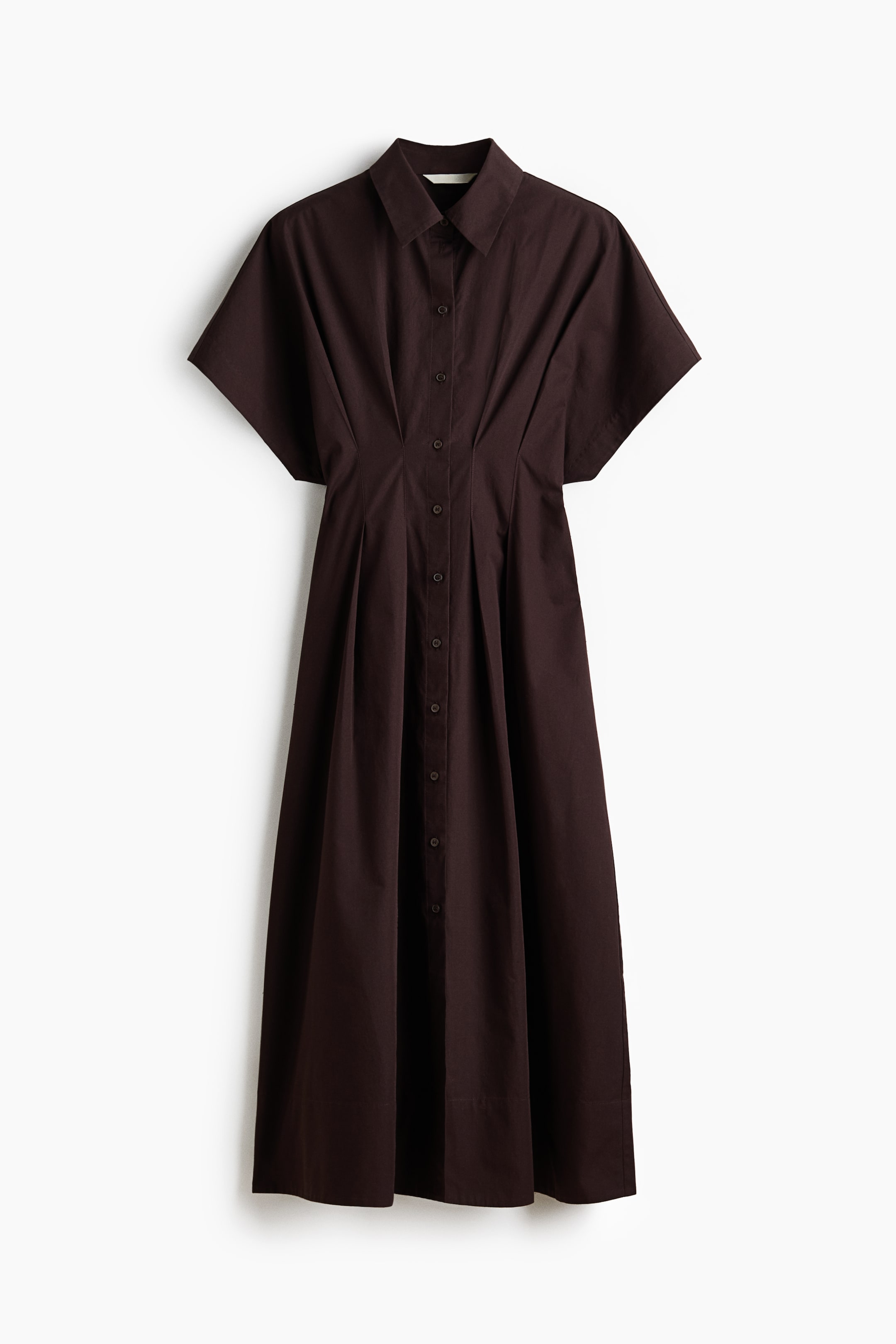 View larger image: A deep brown midi shirt dress is showcased from the front, highlighting a pointed collar, short wide sleeves, and a full-length button placket. The bodice is tailored at the waist with vertical pleats, flowing into a flared A-line skirt.