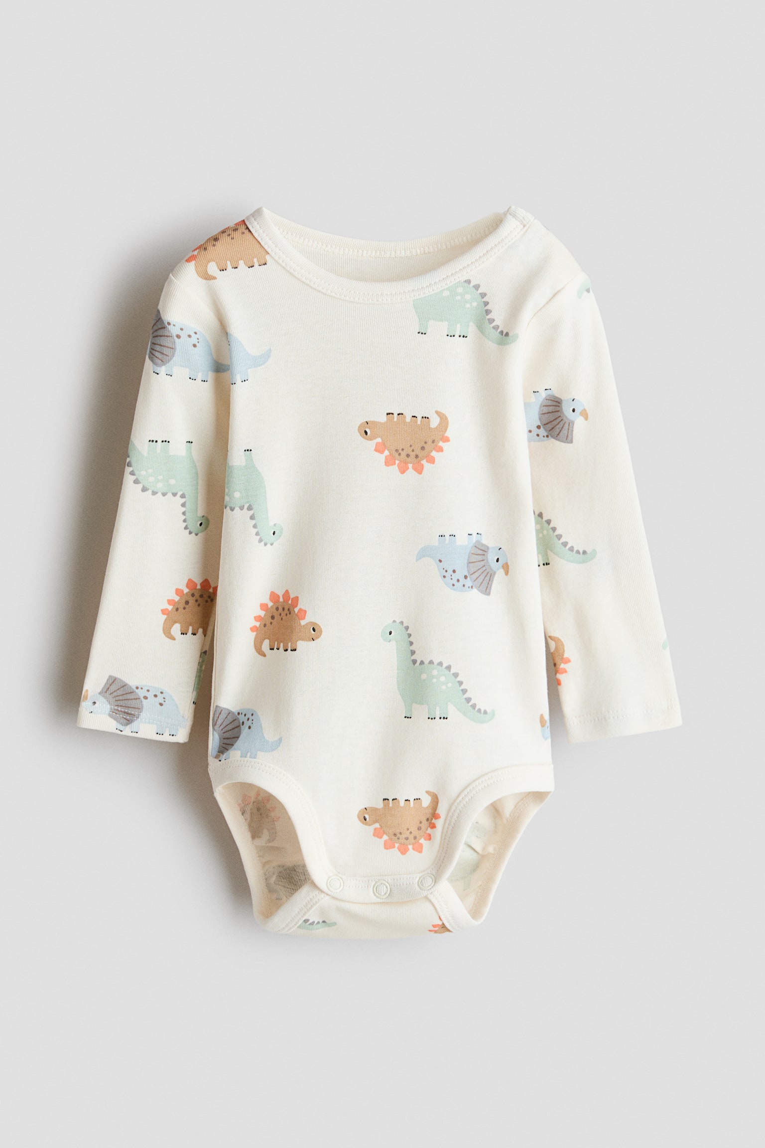 Mönstrad body i bomull - Crèmevit/Dinosaurier/Crèmevit/Fordon/Crèmevit/Körsbär/Mörkgrå/Hjärtan/Ljusbeige/Djur/Ljusrosa/Blommig