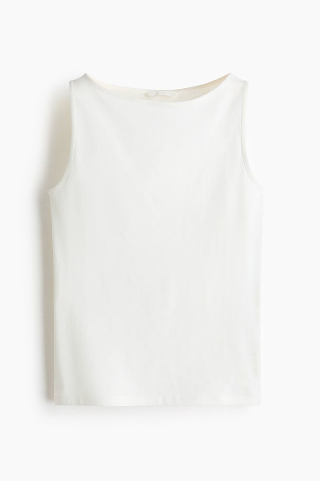 A white vest top is showcased from the front, highlighting a delicate boat neckline, a straight-cut hem, and a soft, smooth jersey fabric. - 1