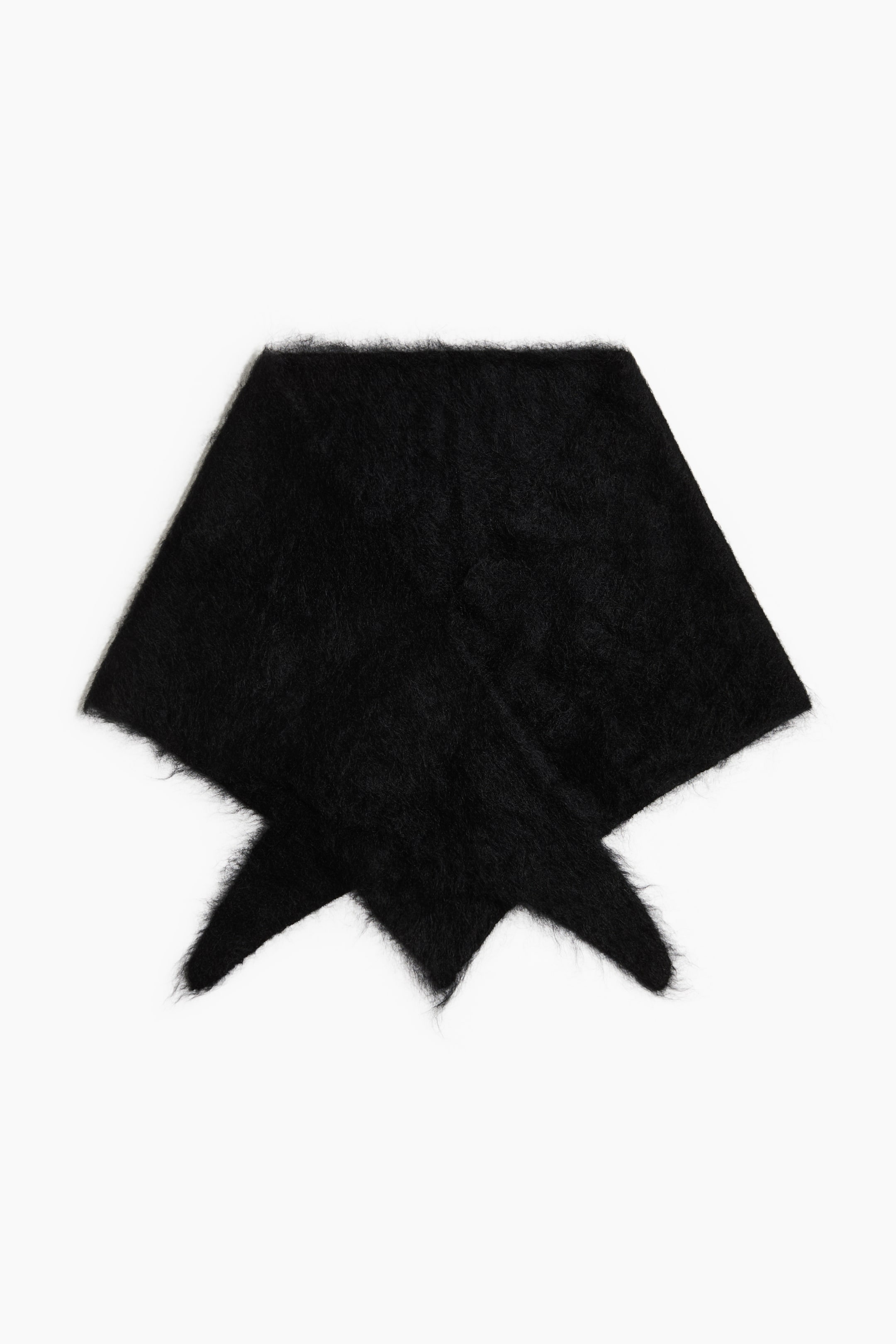 View larger image: A black fuzzy knit scarf is lying flat in a front view, folded into a triangular shape with its pointed ends overlapping at the bottom. The scarf features a textured, hairy surface with soft, brushed fibres.