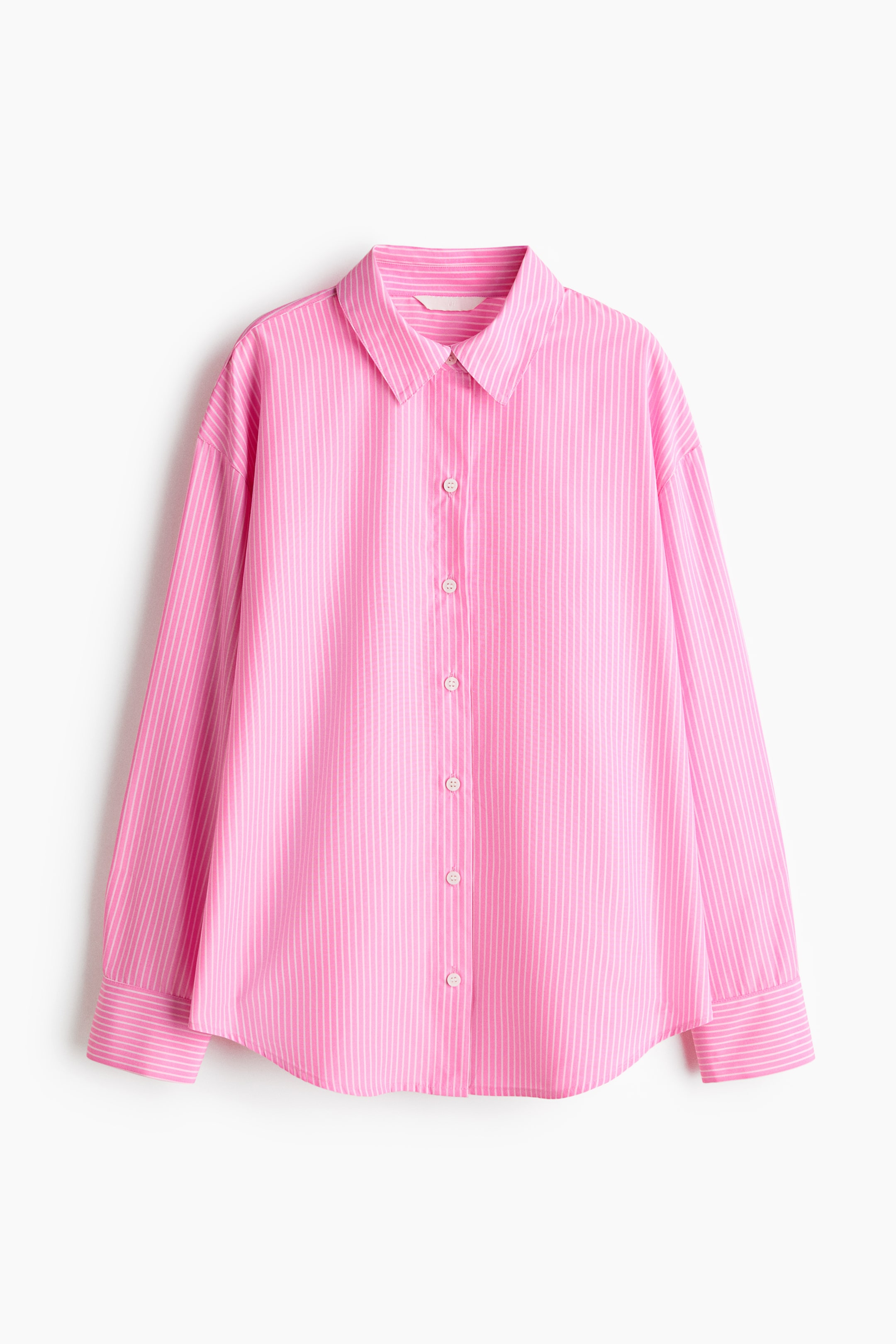 View larger image: A pink shirt adorned with slender white vertical stripes is showcased in a front view. It highlights a pointed collar, a complete button-up front with white buttons, long sleeves with single-button cuffs, and a rounded hem.