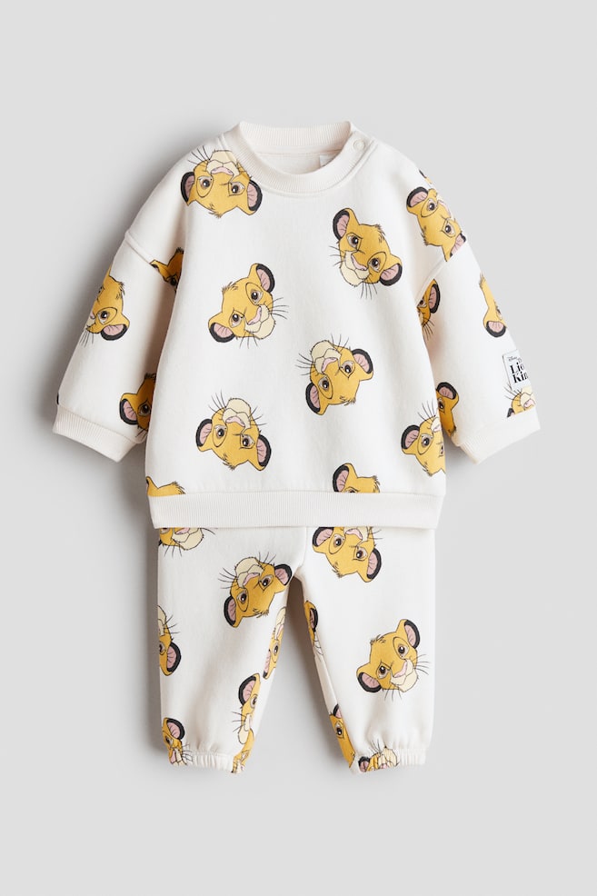 2-Piece Printed Sweatshirt and Joggers Set - Cream/The Lion King/Dark gray/Snoopy/Light gray/Mickey Mouse/Dusty blue/Mickey Mouse/Dark gray/The Lion King/Light gray/Mickey Mouse/Light beige/Winnie the Pooh - 1