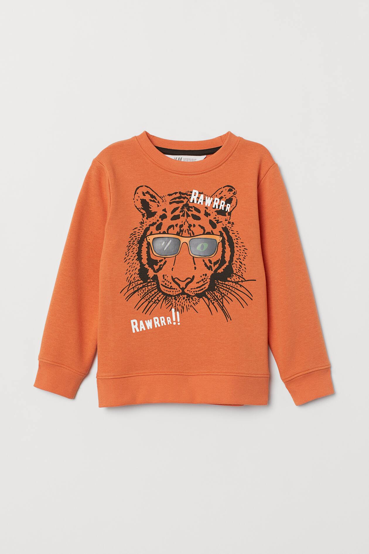 Sweatshirt with a motif - Crew-neck - Long sleeve - Orange/Lenticular ...