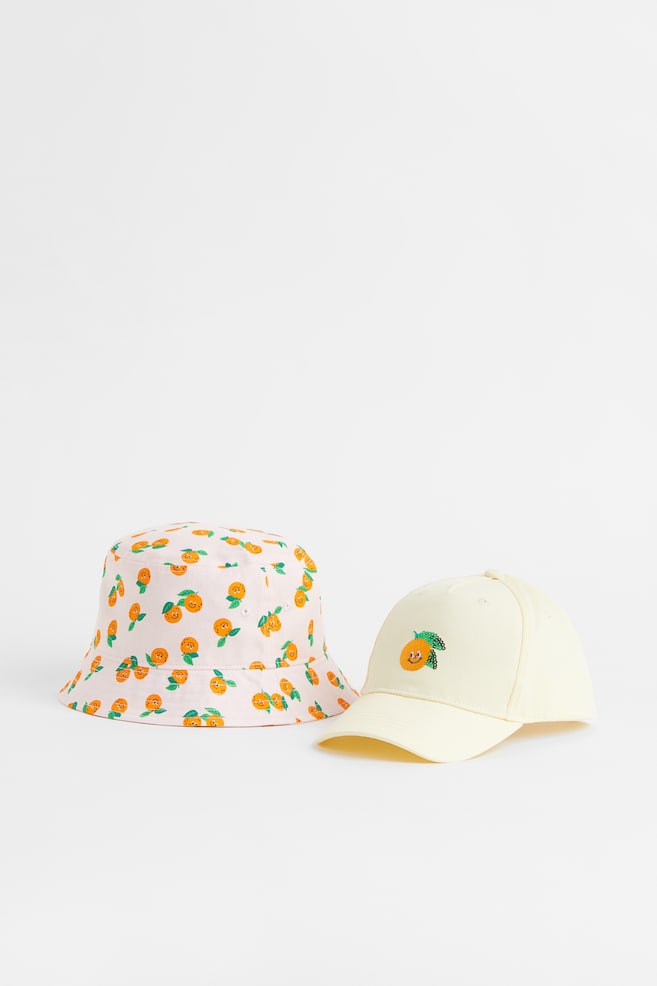 2-teiliges Set mit Cap und Bucket Hat - Hellgelb/Apfelsinen/Naturweiß/Schmetterlinge - 1