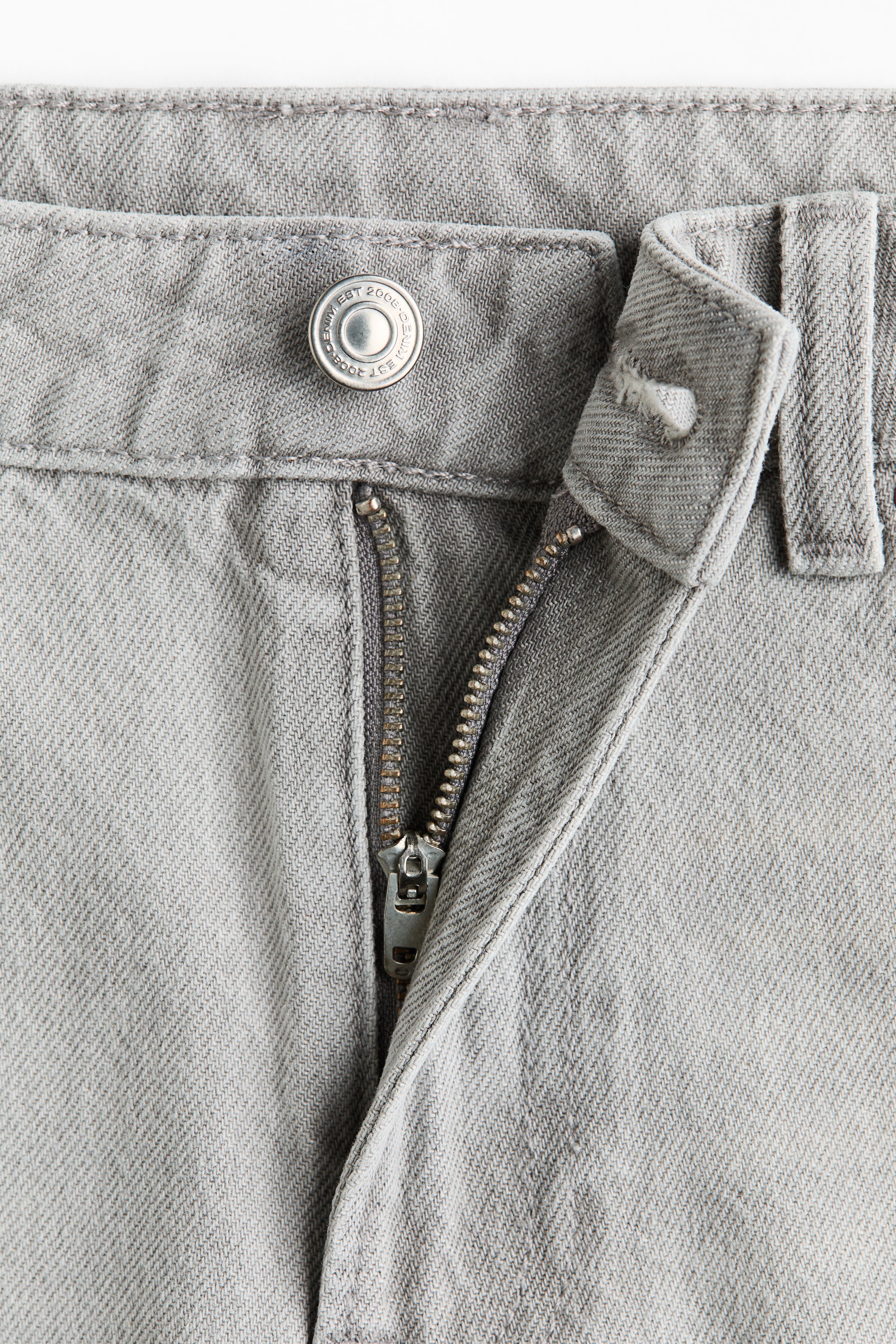 Raw-edge denim shorts