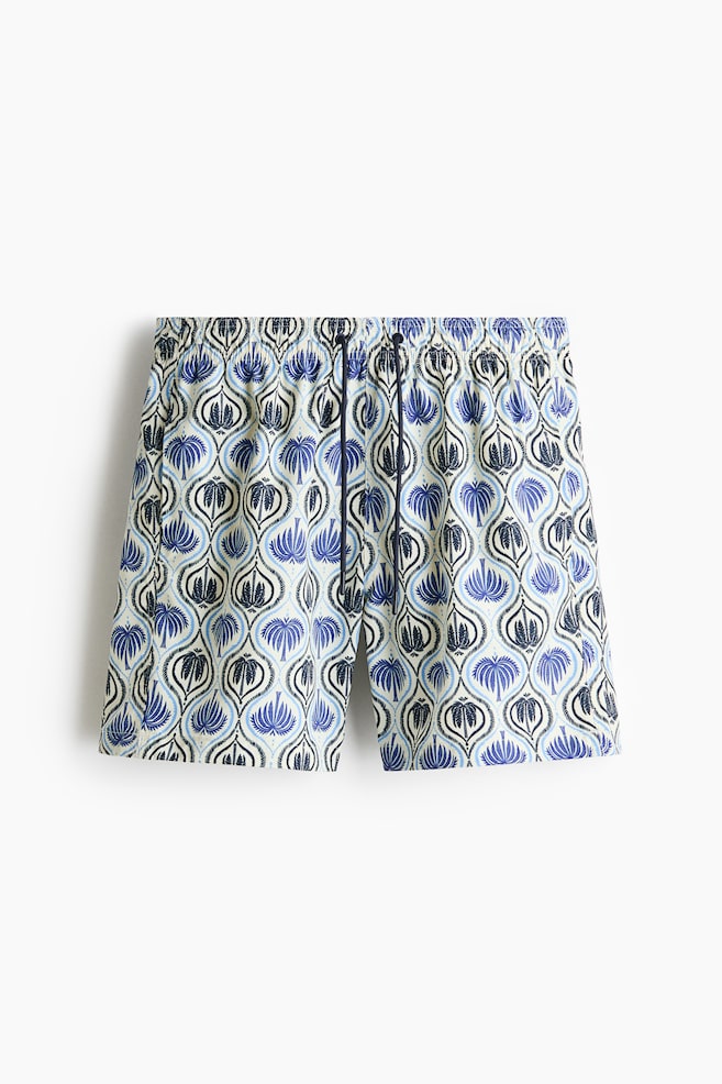 Patterned swim shorts - White/patterned/Navy blue/patterned/Black/patterned/Dark gray/floral/Cream/floral/Brown/patterned - 1