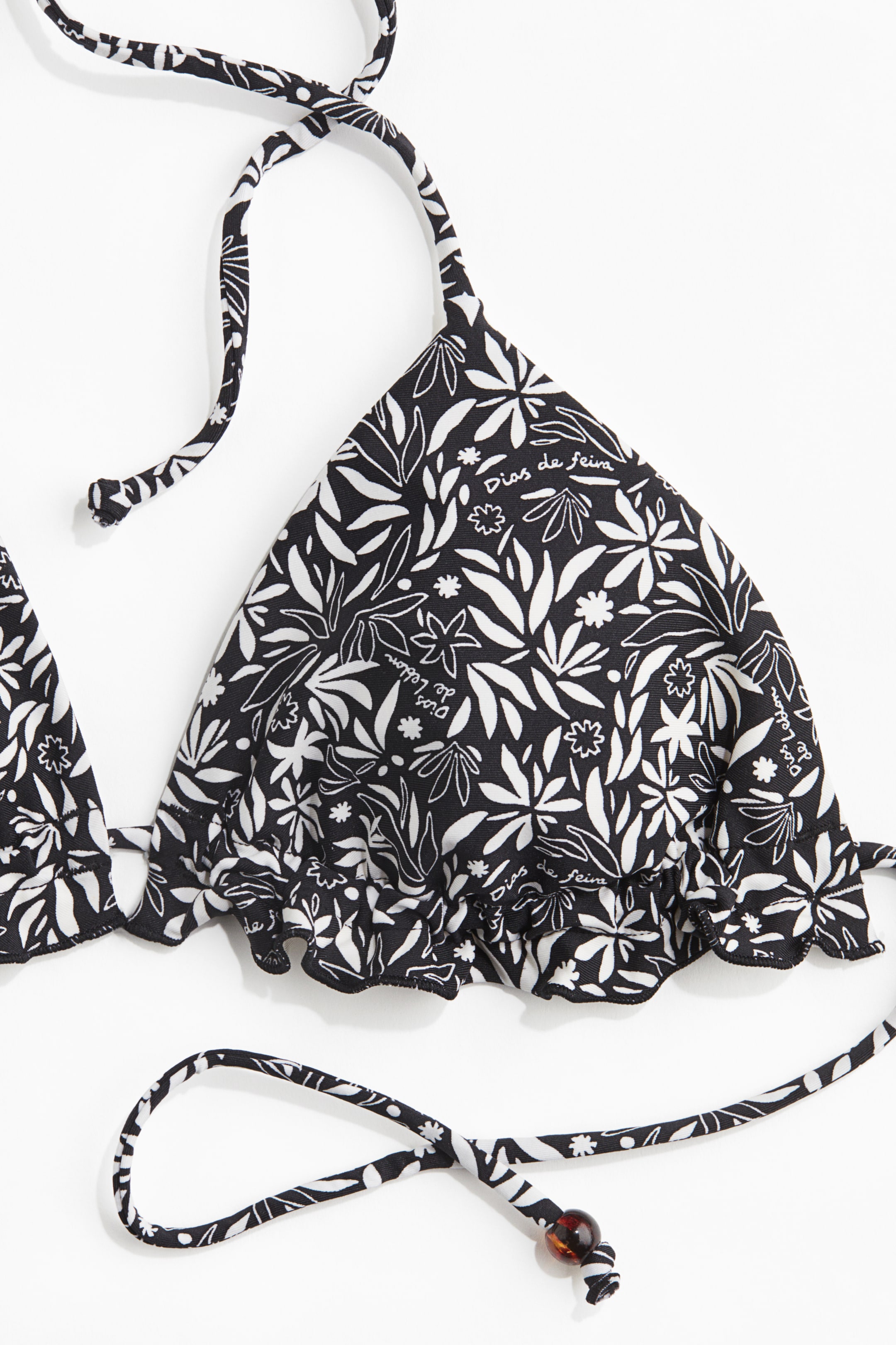Ampliar la imagen: Top de bikini triangular con relleno - Negro/Flores blancas - Ladies | H&M MX 6