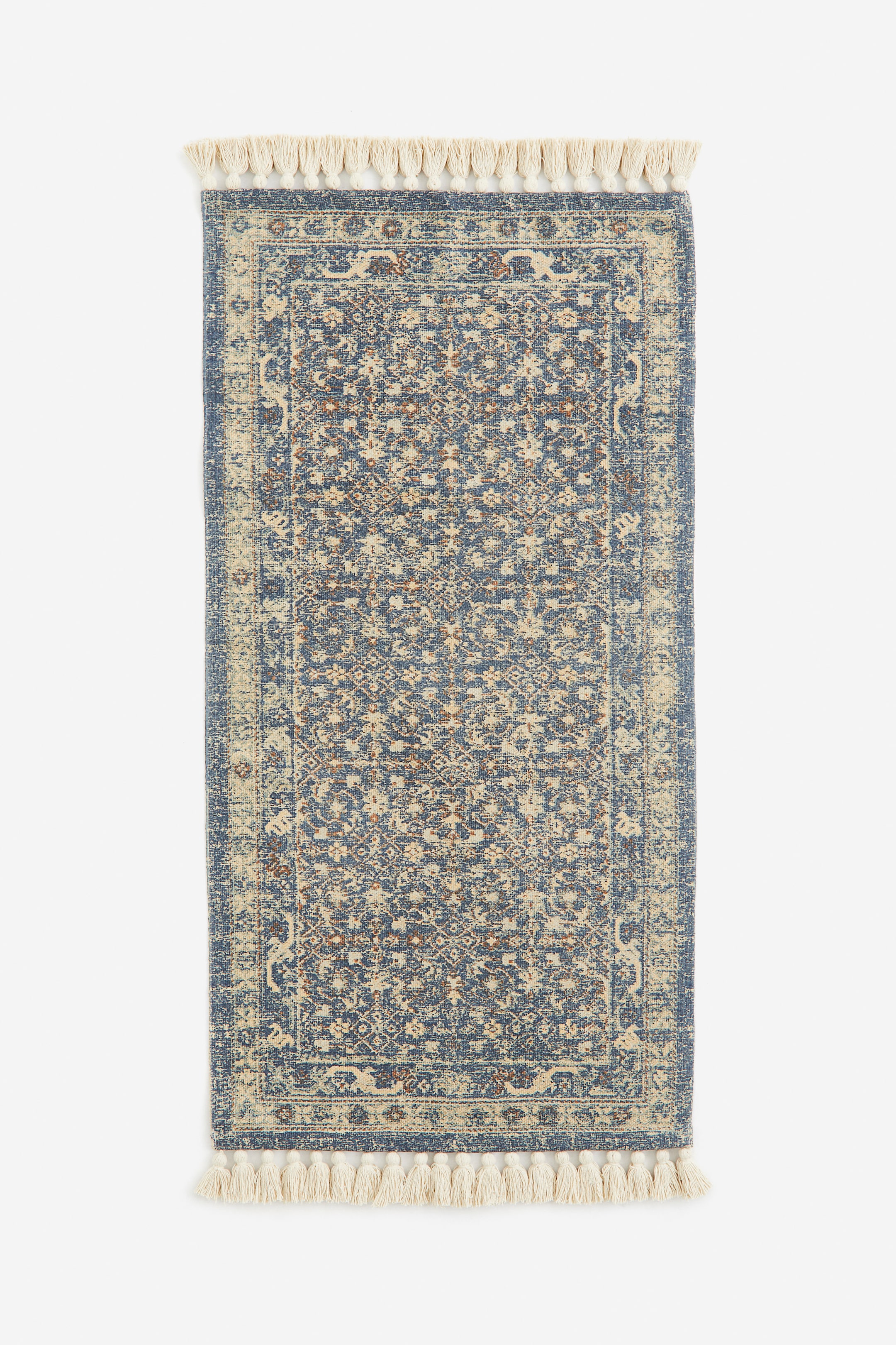 Patterned Rug with Fringe