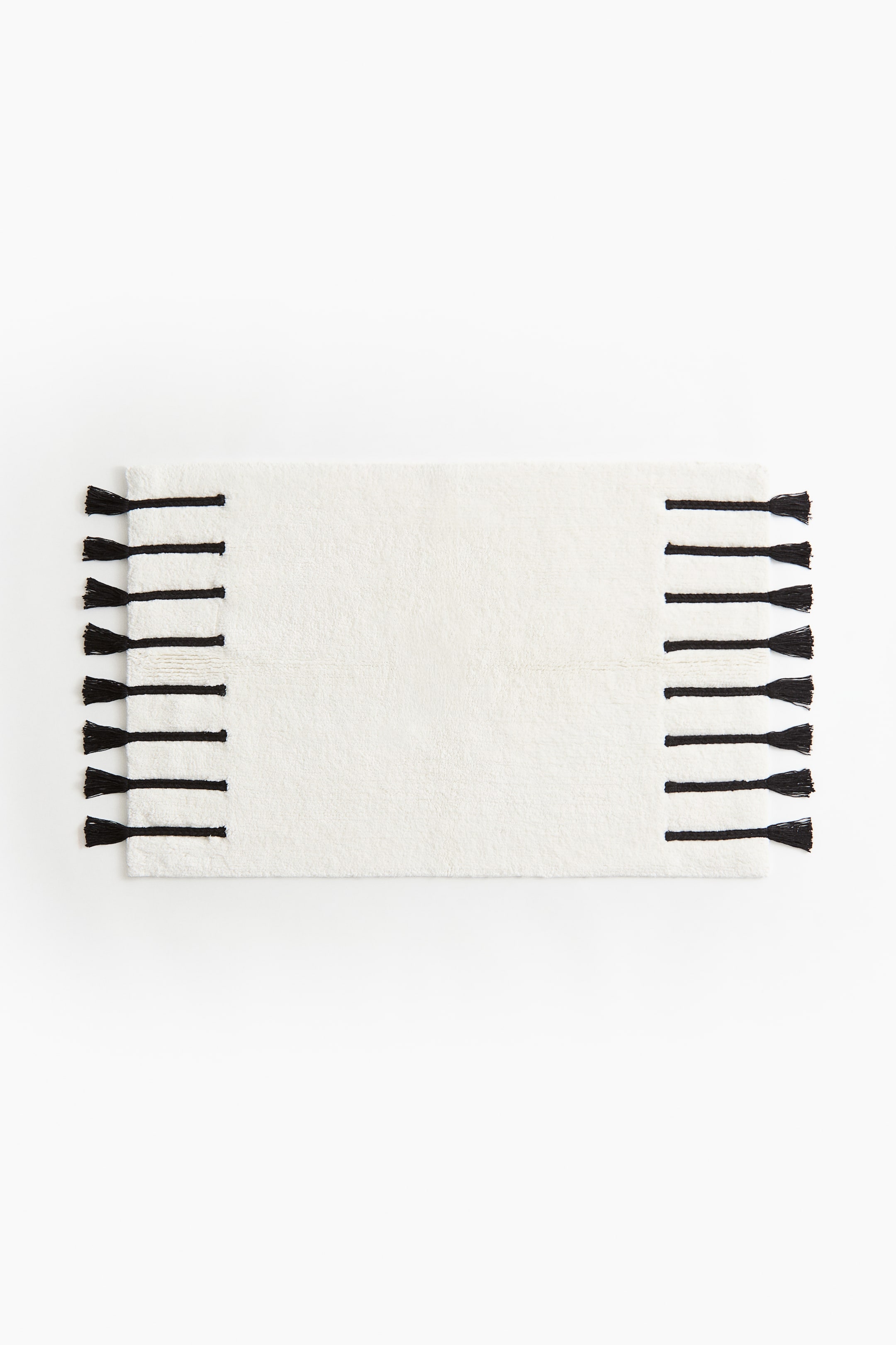 拡大画像を表示: タフテッドバスマット タッセルデザイン - ホワイト/ブラック | H&M JP 1