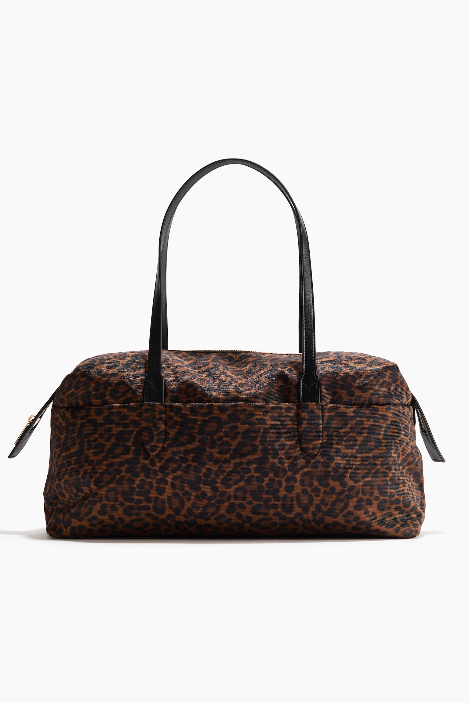 A rectangular shoulder bag showcasing a brown and black leopard print. It features two slender black top handles and a visible zip closure with a black pull tab. - 1