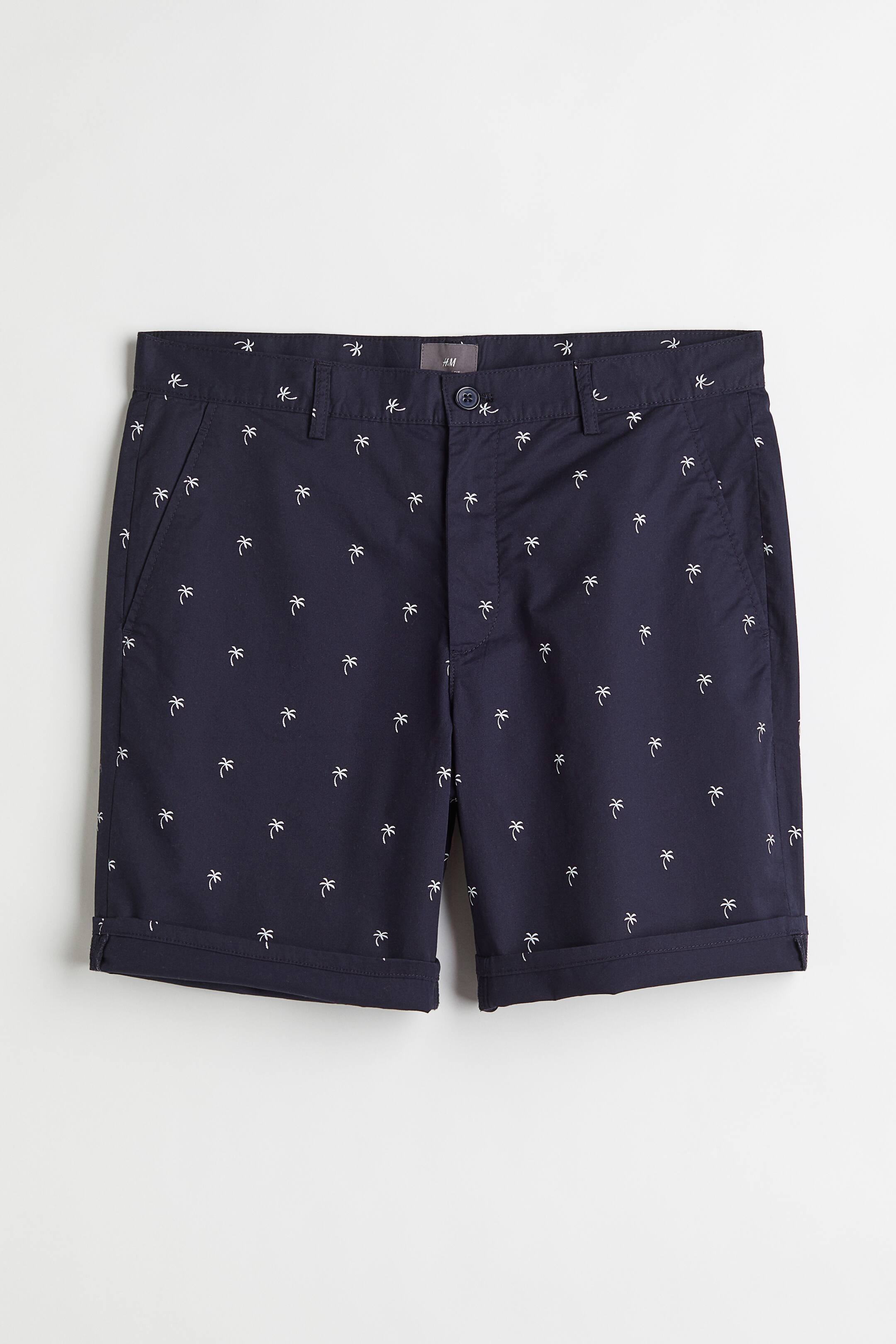 View larger image: Regular Fit Chino shorts - Navy blue/Palm trees - Men | H&M 1