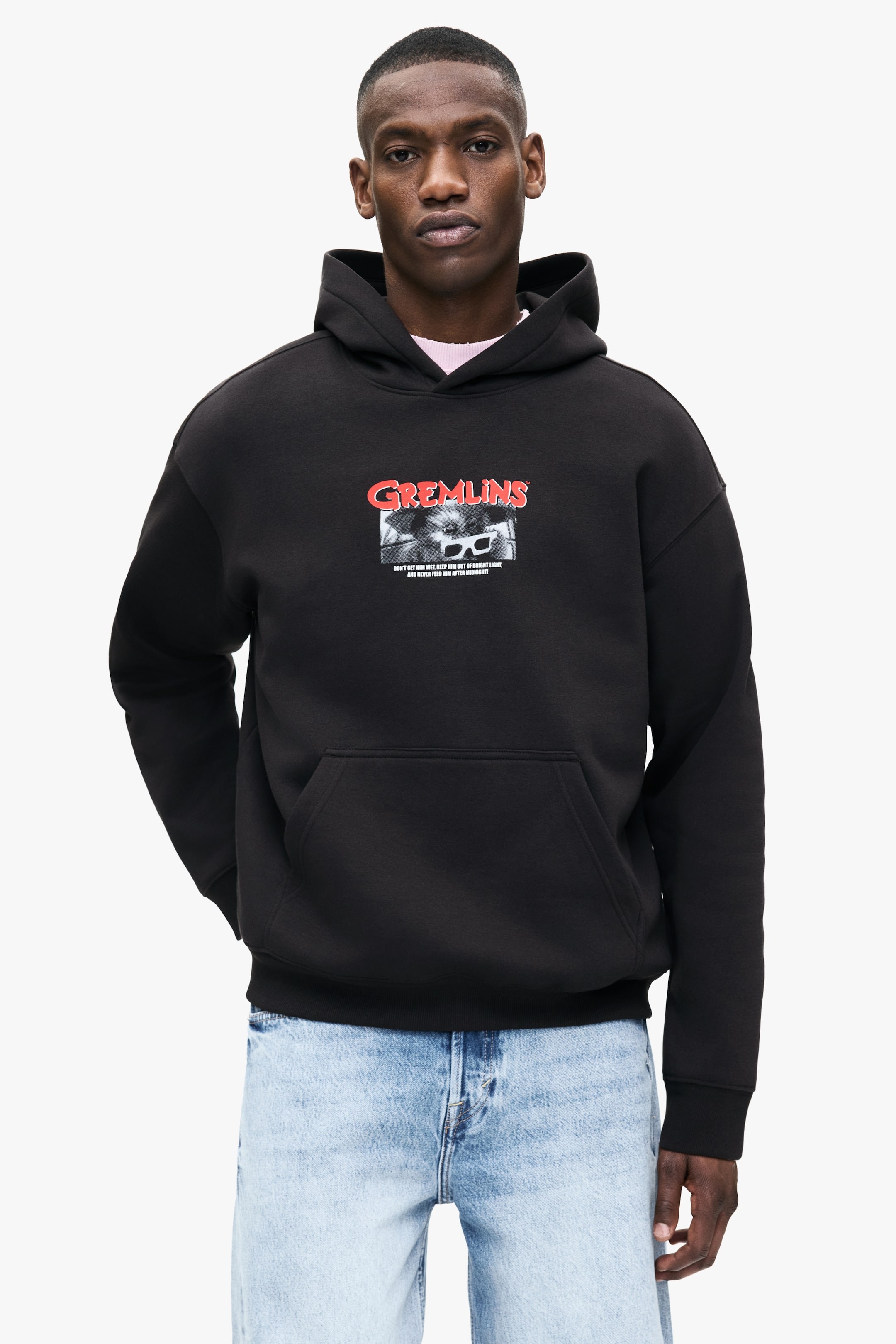 Ver imagen más grande: Sudadera con capucha Loose Fit - Negro/Gremlins - HOMBRE | H&M ES 1