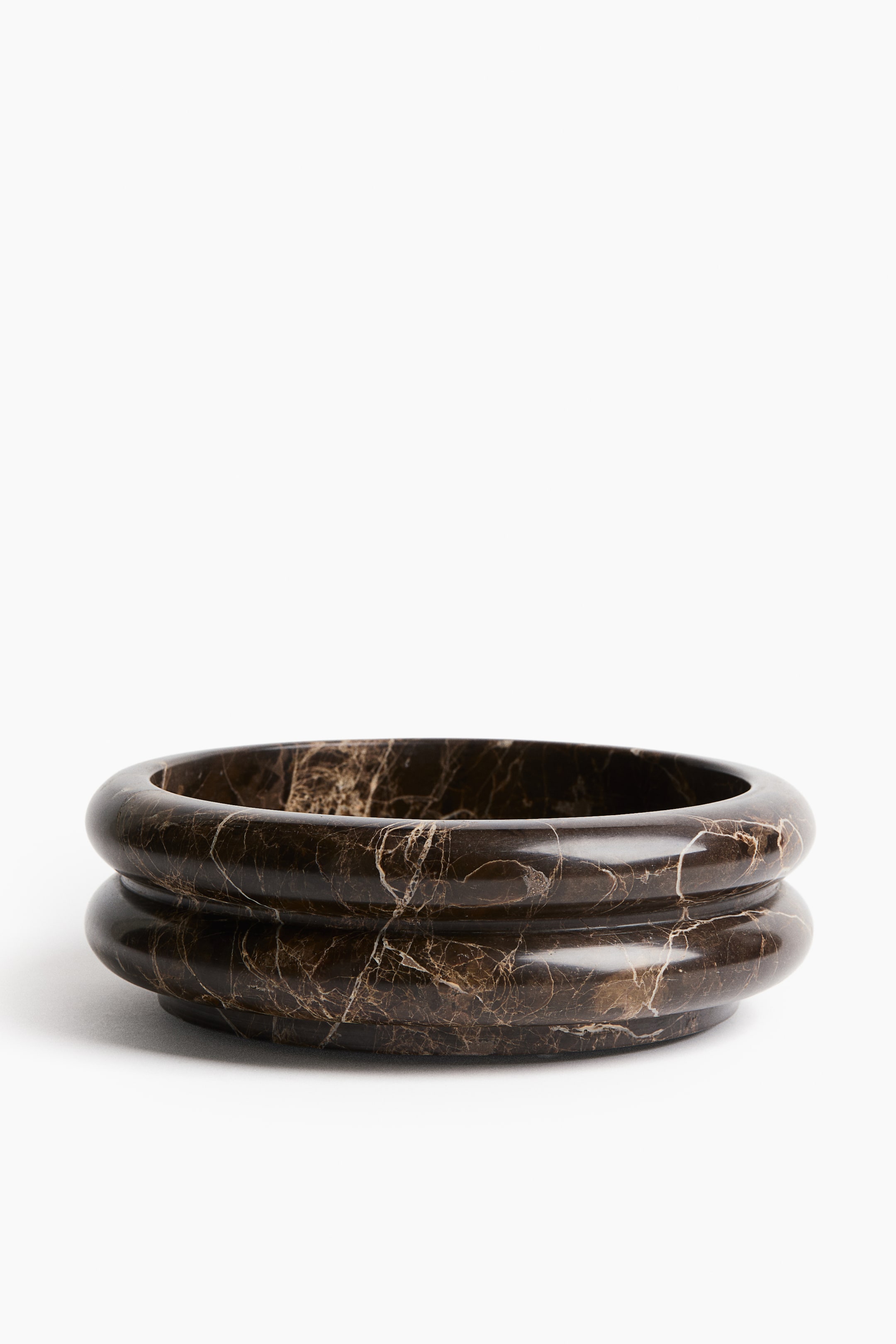 View larger image: A round dark brown marble bowl featuring intricate lighter veining and a stacked, rounded profile, shown from a front-facing angle.